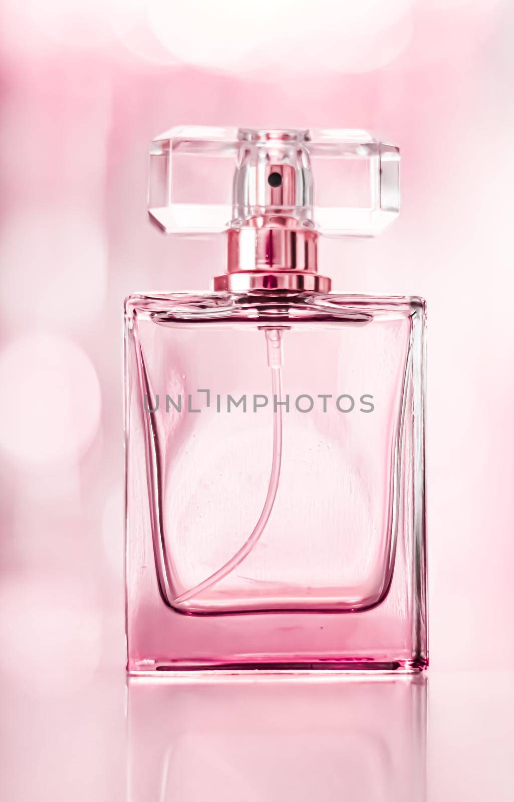 Perfume bottle on glamour background, floral feminine scent, fragrance and eau de parfum as luxury holiday gift, cosmetic and beauty brand present concept