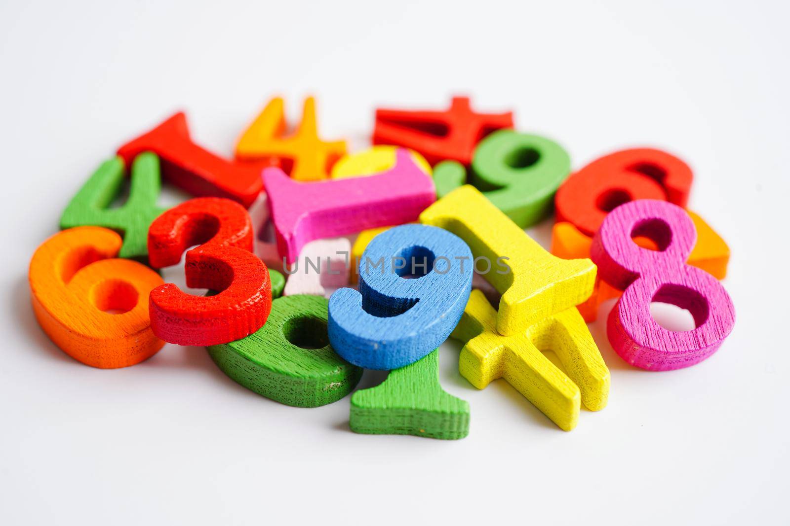 Number wood block cubes for learning Mathematic, education math concept.