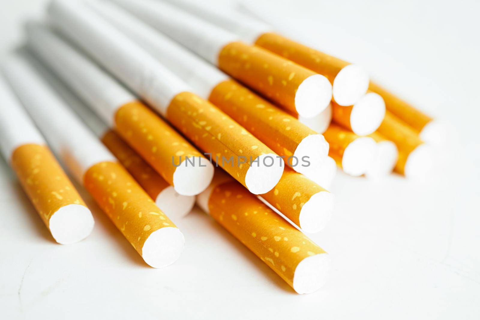 Cigarette, roll tobacco in paper with filter tube, No smoking concept.