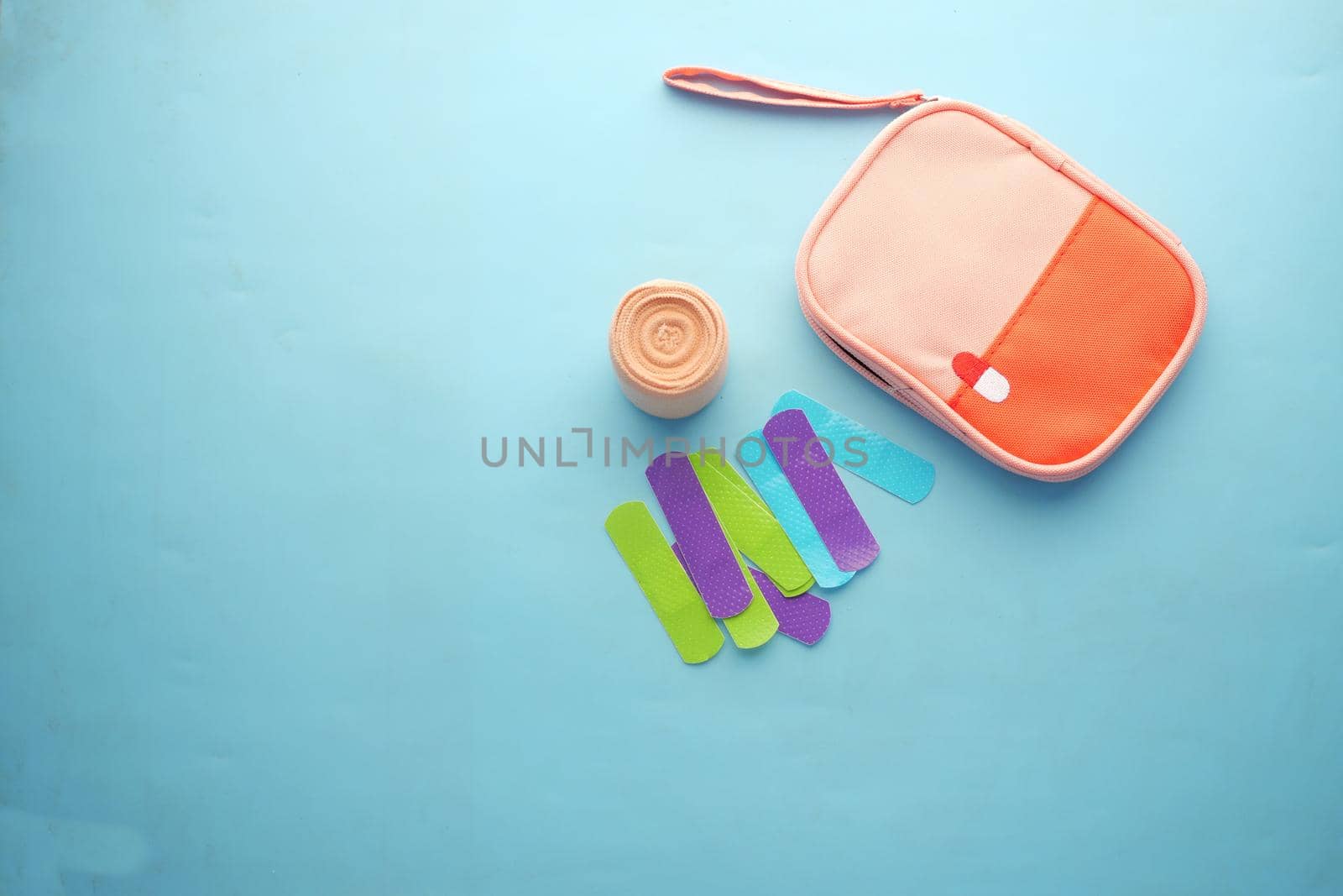 colorful adhesive bandage on white background .