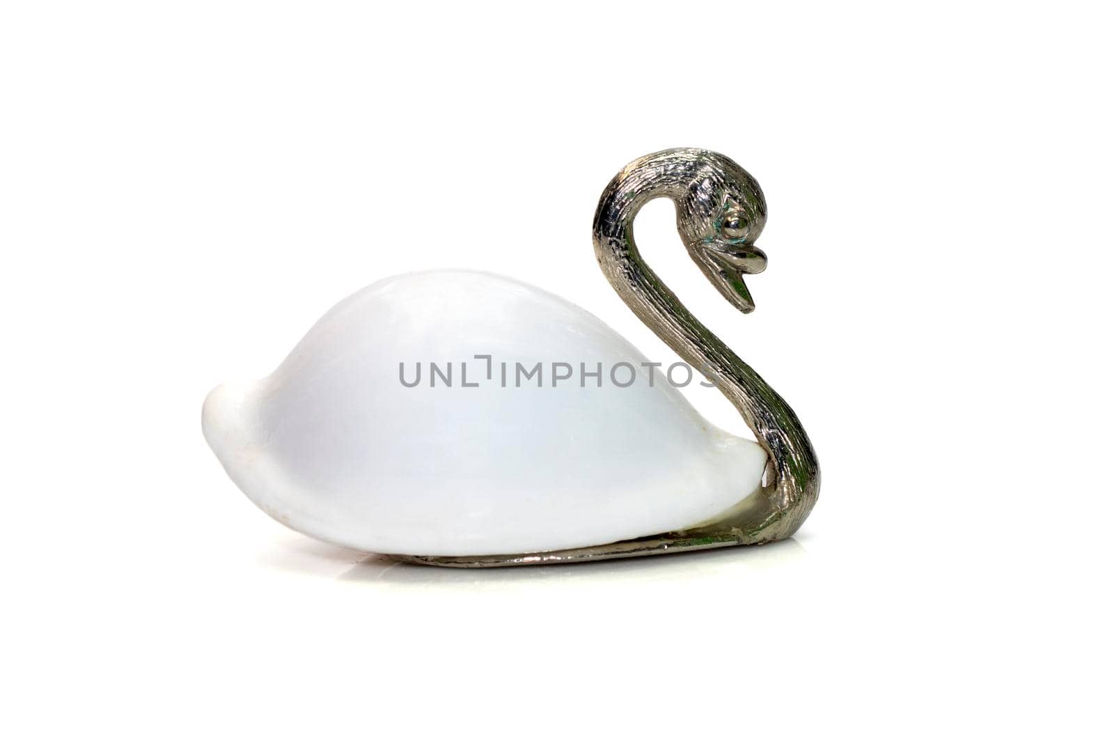 Image of swan sculpture with white shells(Ovula ovum) as part of its body. isolated on white background. Home decoration. by yod67