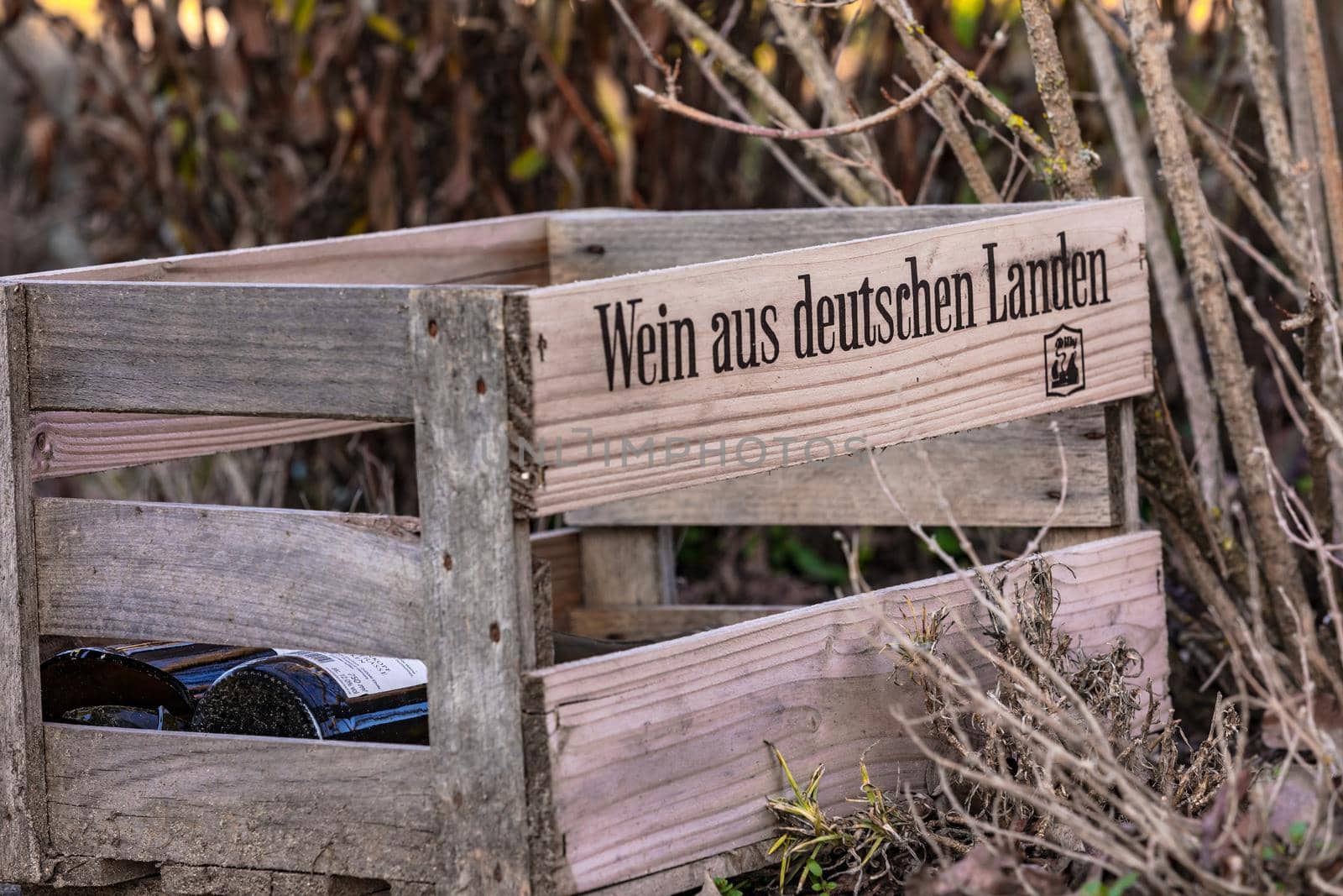 Still life with a wooden box in the great outdoors in pale light
