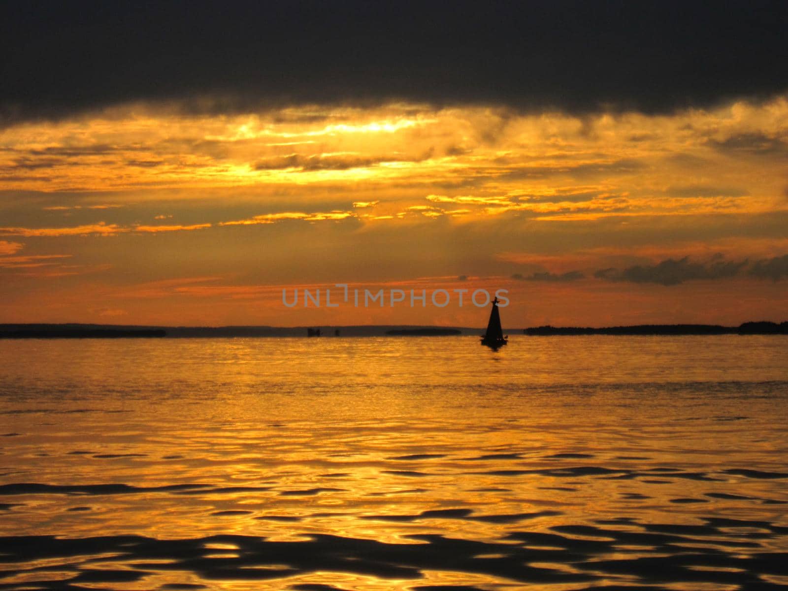 View of Evening River in Brass Color. Dark Scenic Dramatic Landscape of Sky and River Horizon