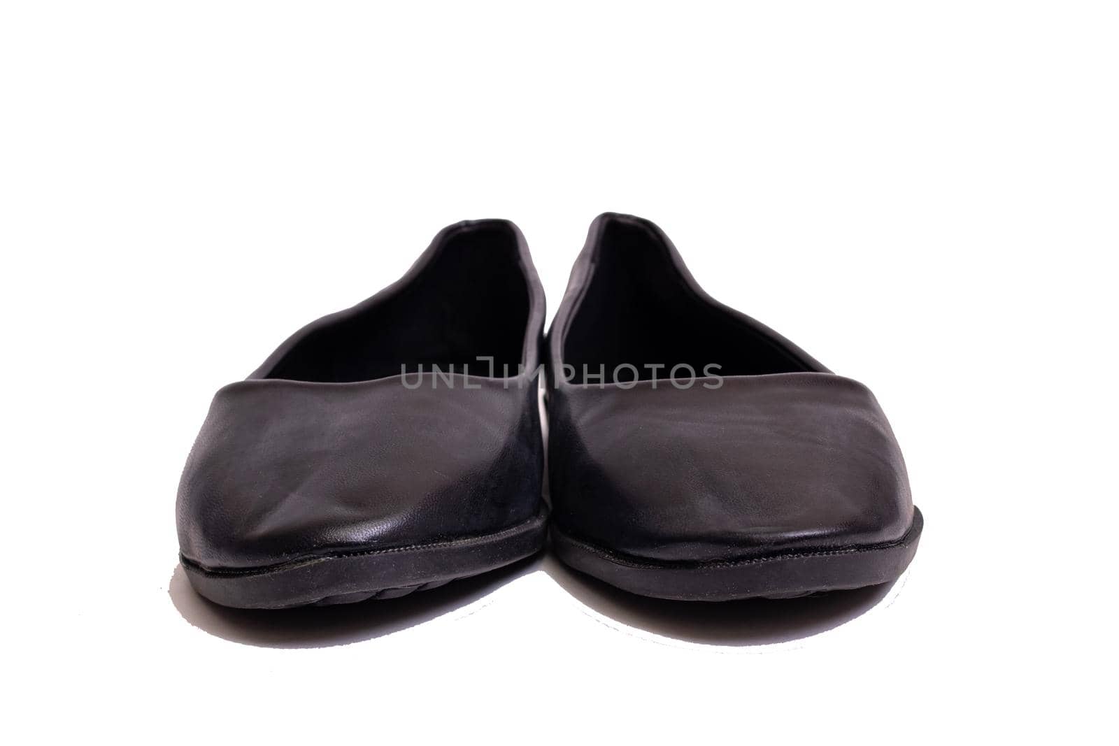 Black female shoes isolated on white background close up