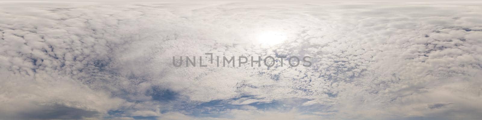 Blue sky with Cumulus clouds Seamless panorama in spherical equirectangular format. Complete zenith for use in 3D graphics, game and for composites in aerial drone 360 degree panoramas as a sky dome.