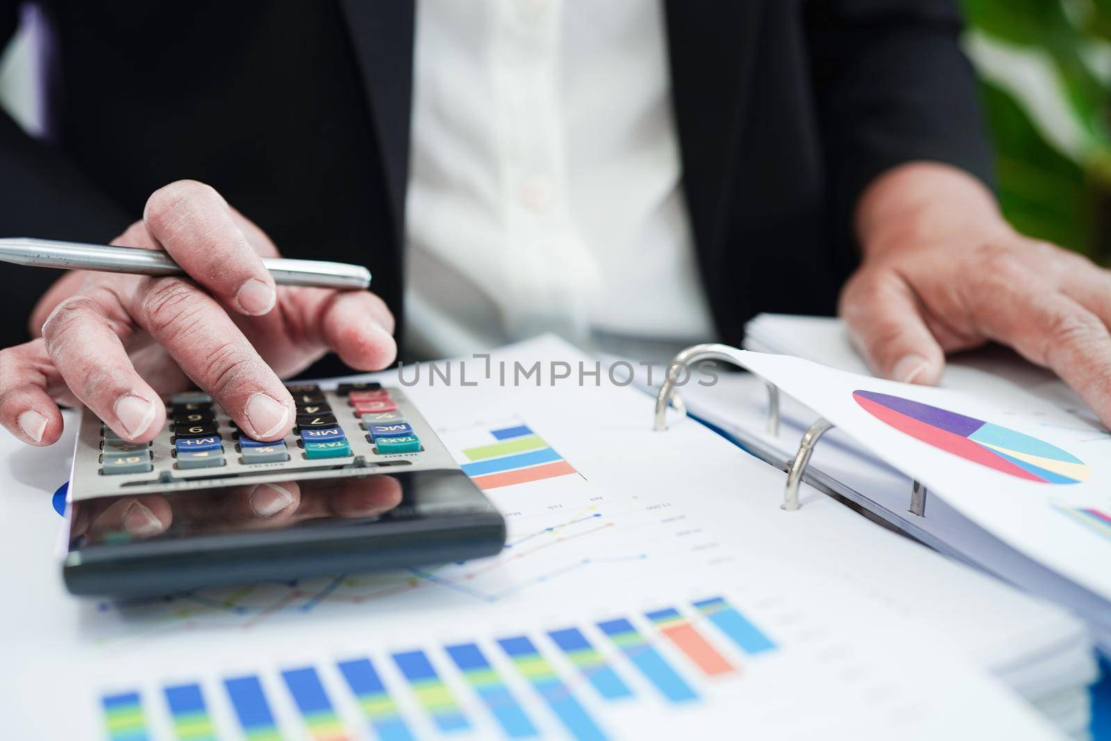 Business woman working and analysis with statistic graph in office. 