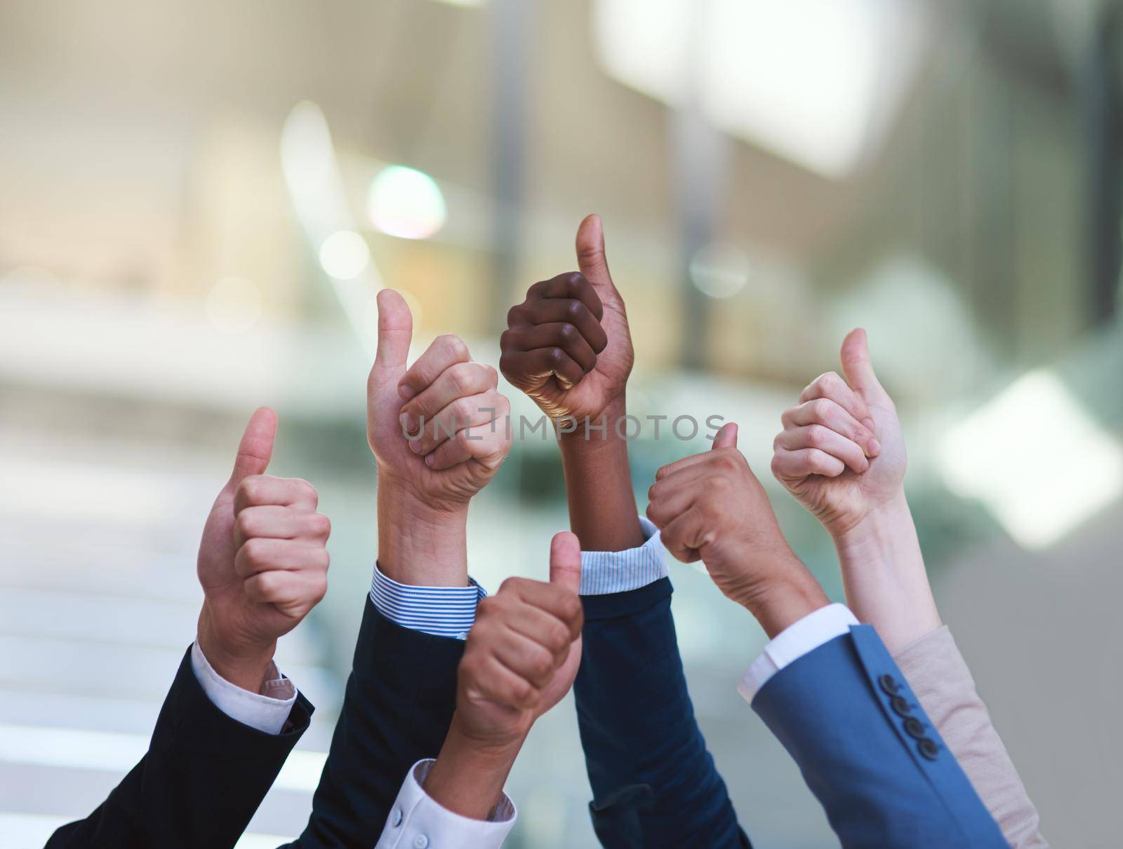 Youre on the right track. a group of hands showing thumbs up