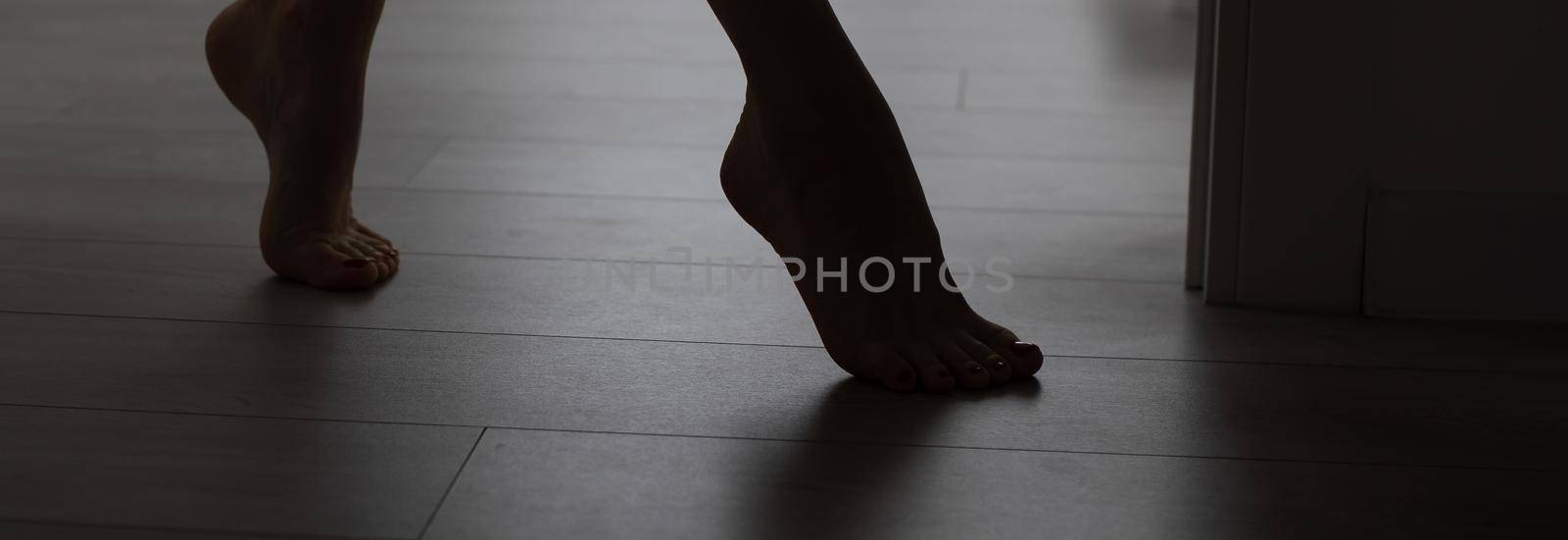 beautiful groomed female legs on a white background.