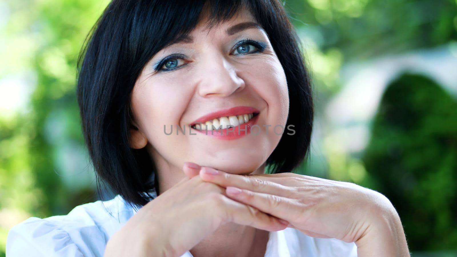 Portrait of pleasant smiling, Happy beautiful real 40 years old woman. by djtreneryay