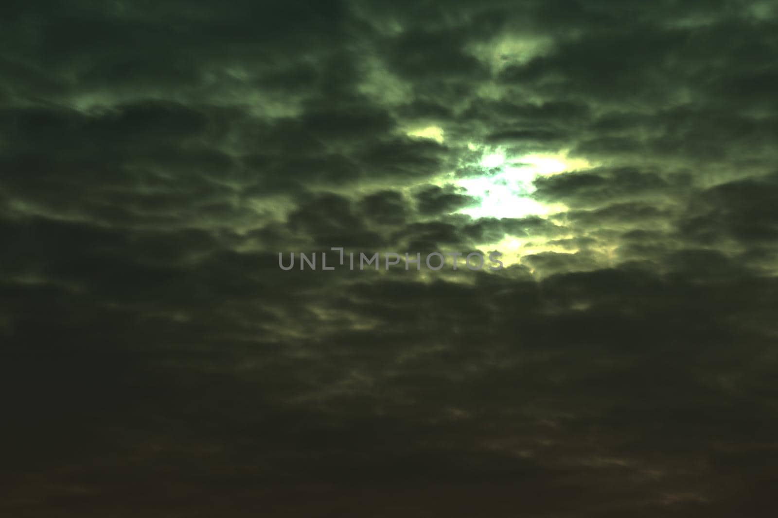 Beautiful abstract nightly clouds landscape in green color