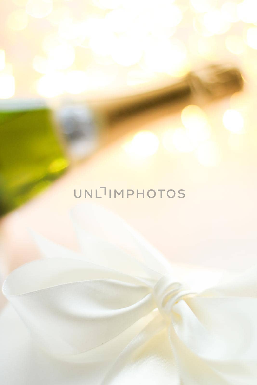 The bottle of champagne and holiday gift box by Anneleven