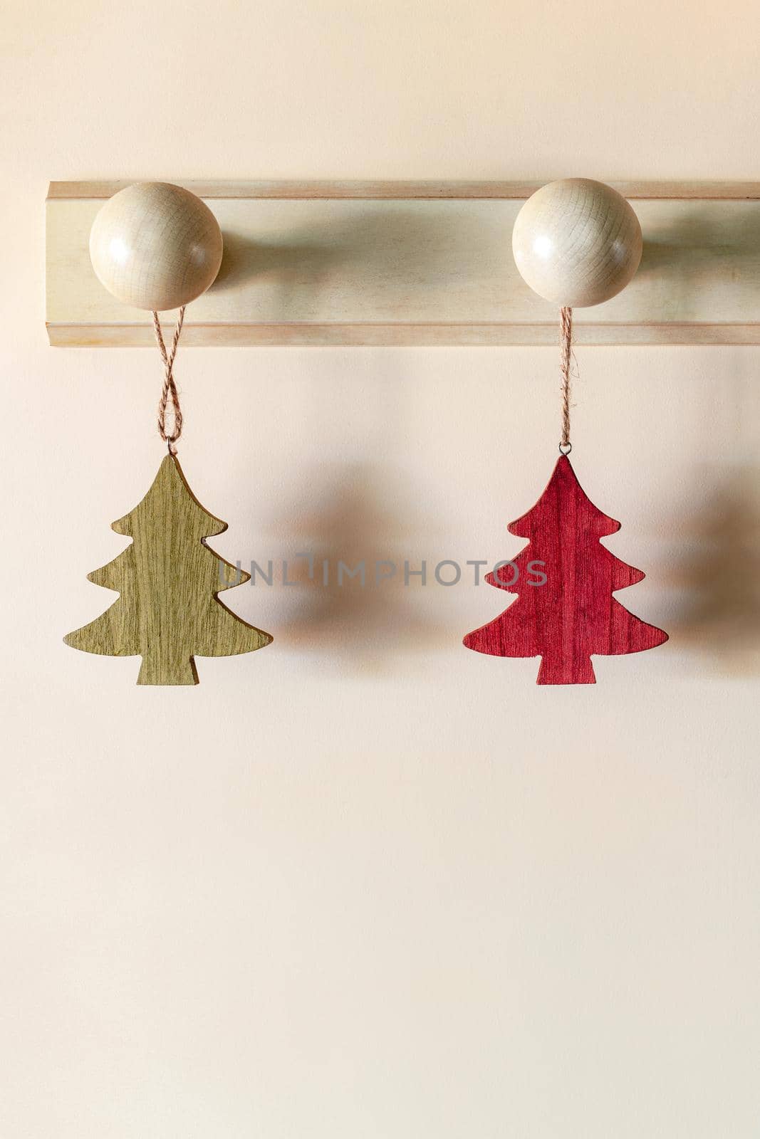 Christmas tree form wooden interior suspended decoration, zero waste idea, minimalism