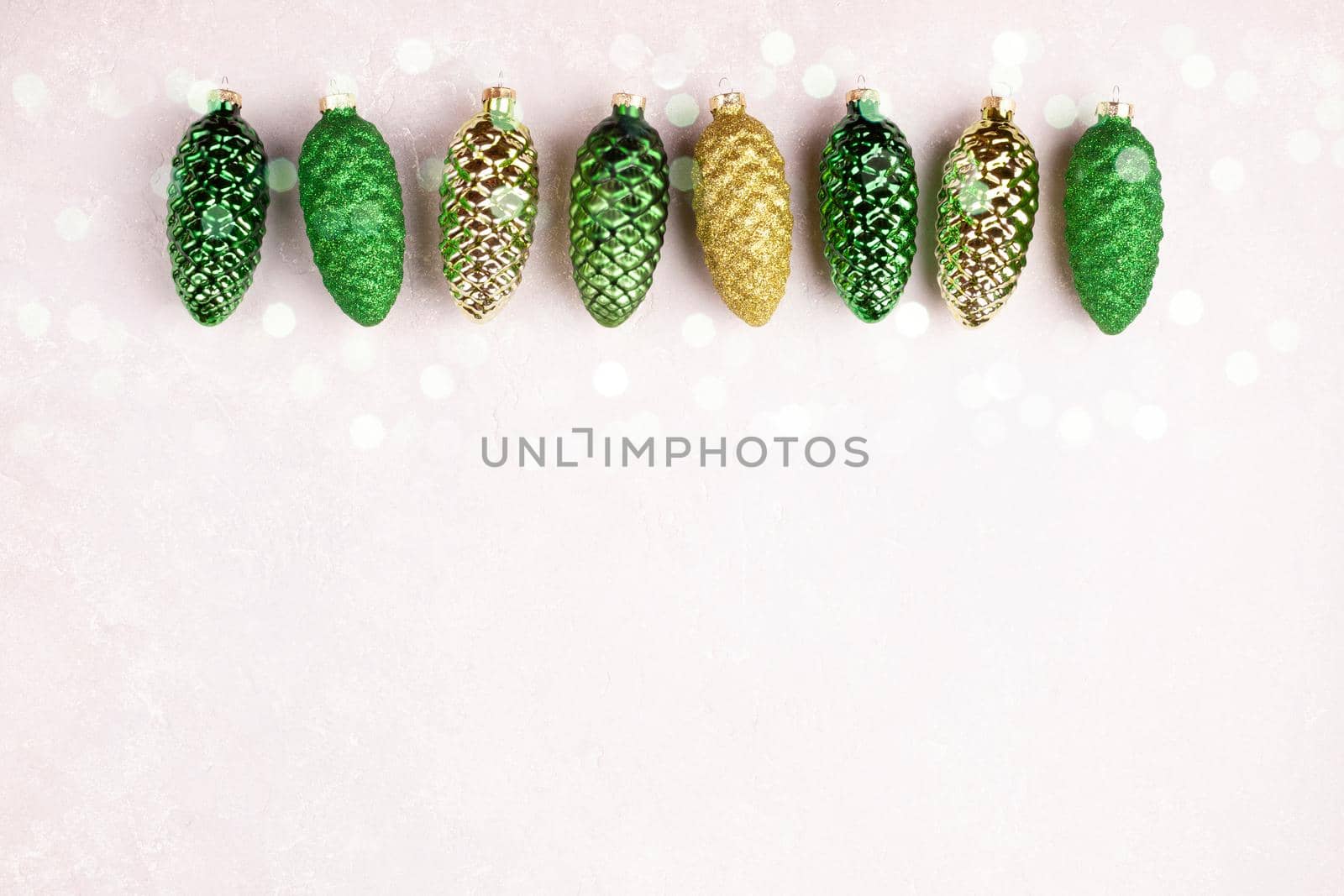 pine cones retro Christmas decoration with twinkles, top view, copy space