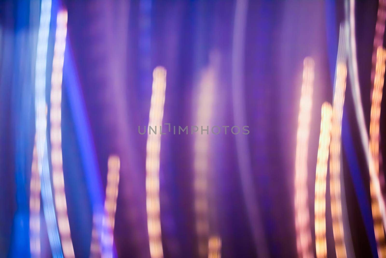 Technology, defocused textures and futuristic design concept - Neon lights background, abstract lines in motion