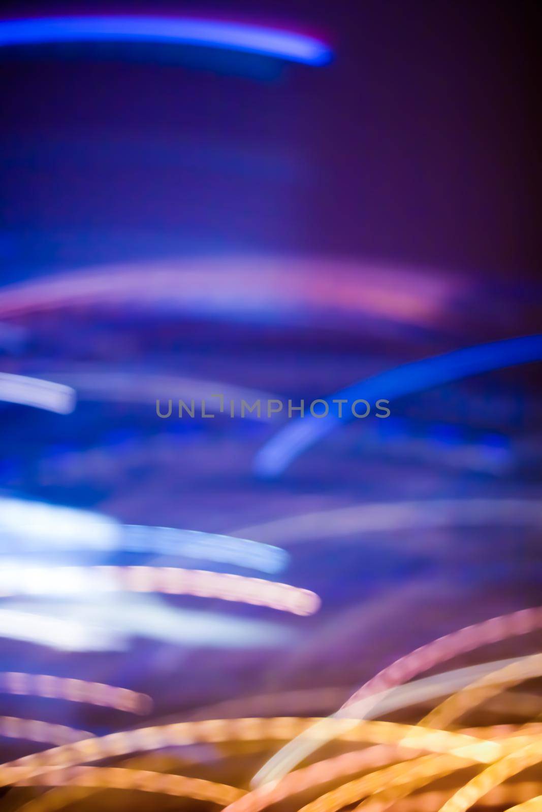 Technology, defocused textures and futuristic design concept - Neon lights background, abstract lines in motion