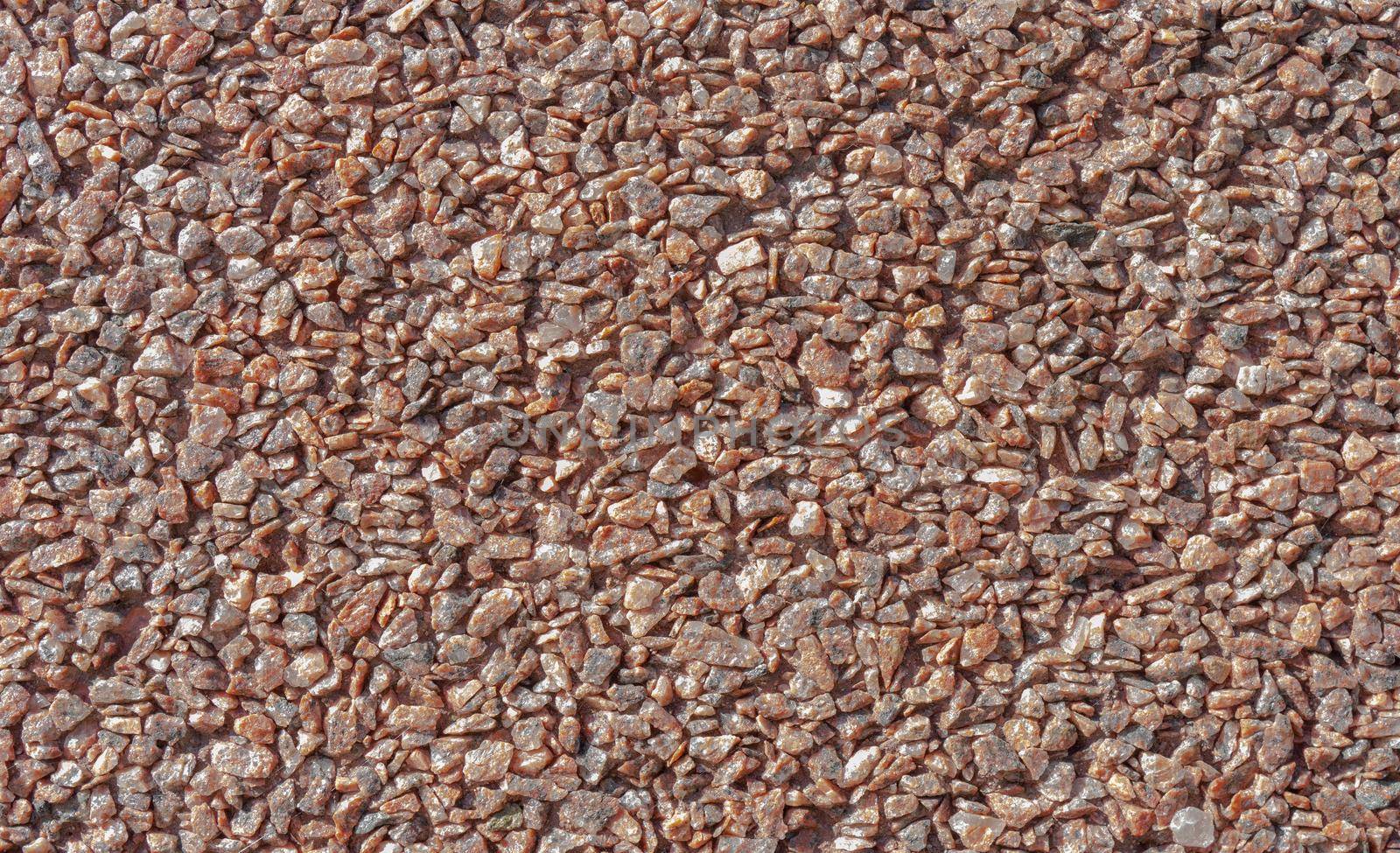 Granite chips for landscaping pebbles close-up. Texture, pattern, background.