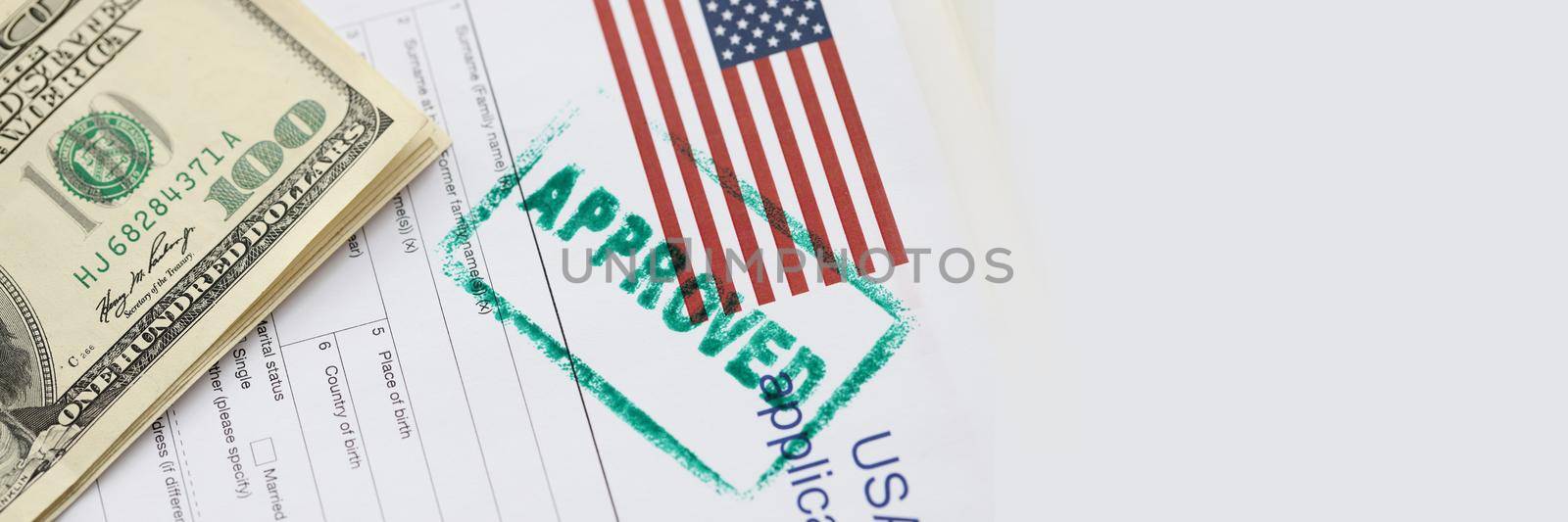 Stamp approved is on documents for obtaining American visa closeup. Permission to travel to united states of america concept