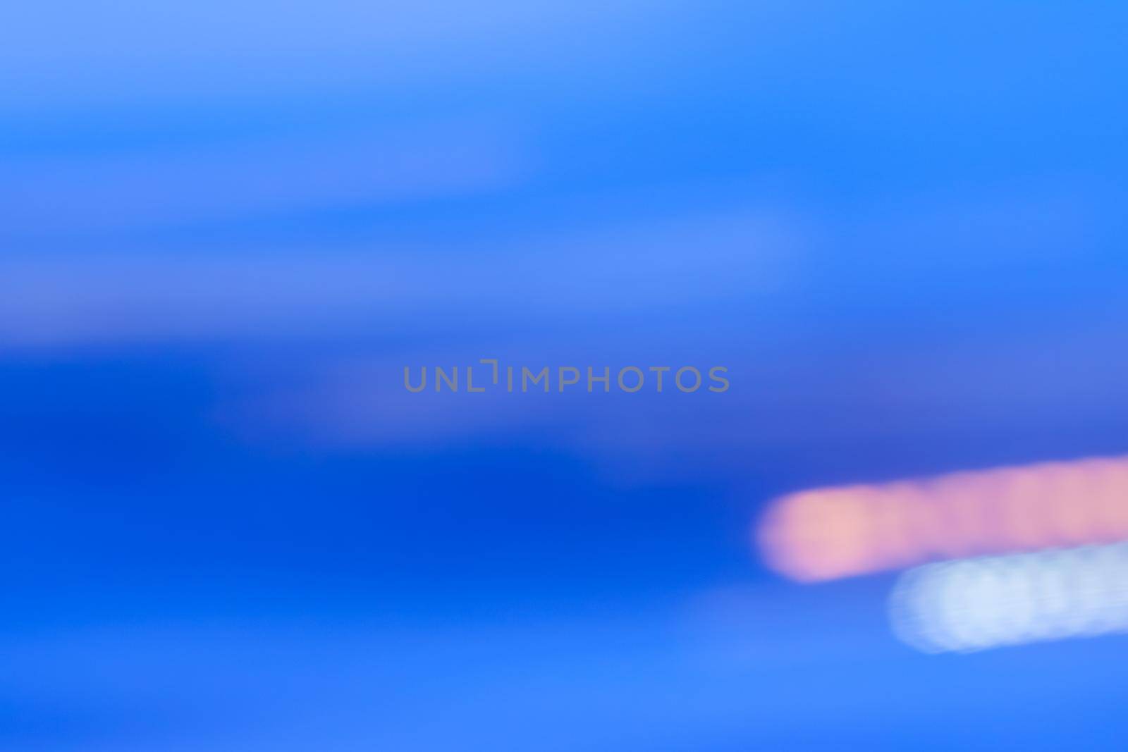 Abstract background, defocused textures and modern design concept - Evening city lights in motion