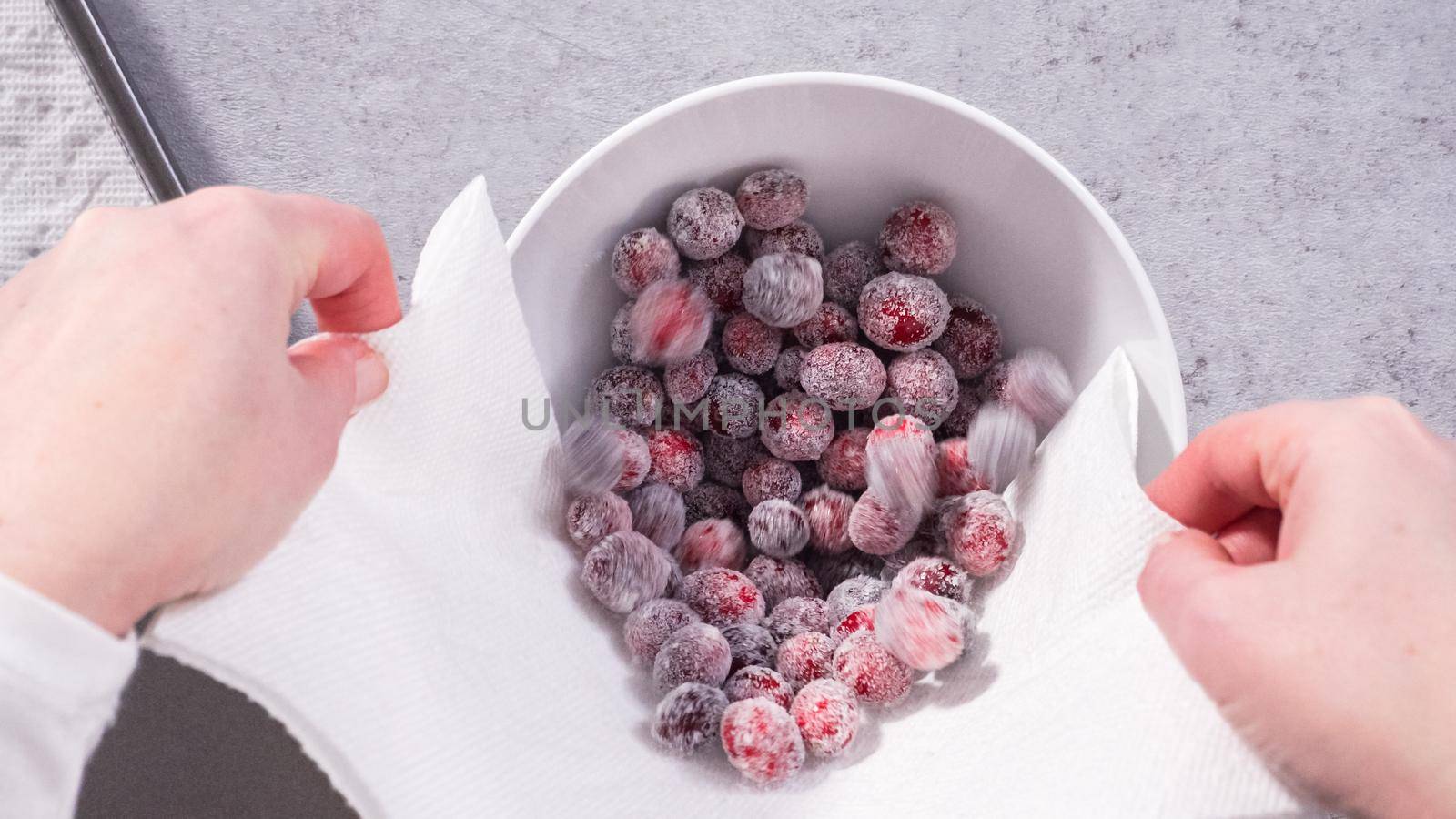 Flat lay. Step by step. Prepating sugar cranberries with organic cranberries and white sugar.