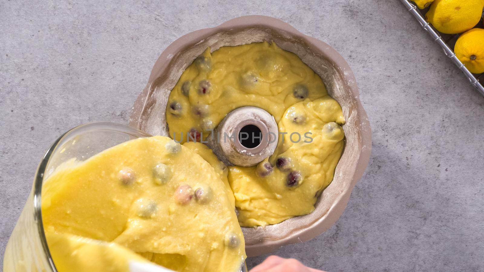 Flat lay. Step by step. Pouring cake batter into the bundt cake pan.