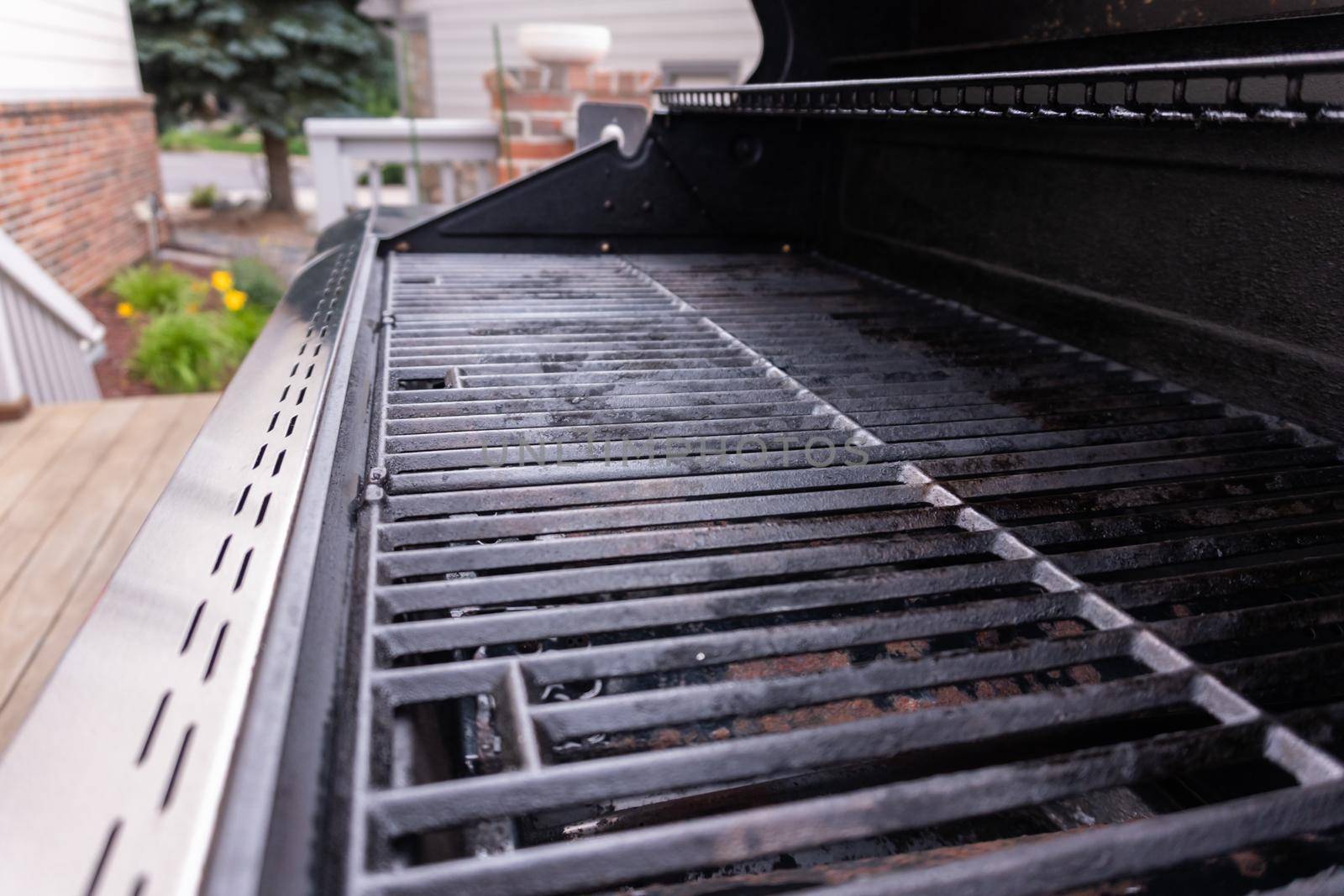 Clean six-burner gas grill ready for summer grilling.