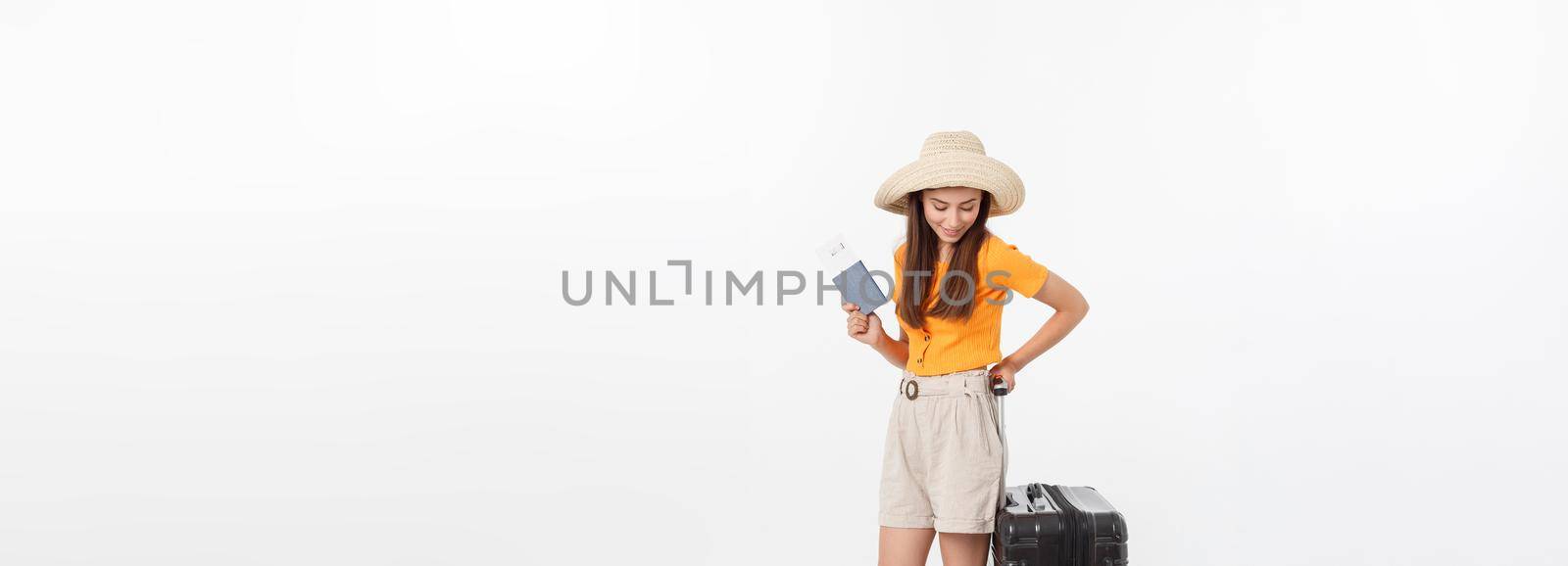 Full length of attractive young female in traveller casual with the travel bag, isolated on white background.