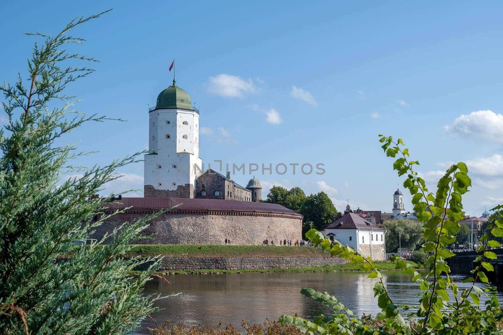 Vyborg, Leningrad region, Russia. - August 27, 2022. View of the medieval knight's castle from the city embankment. Selective focus.