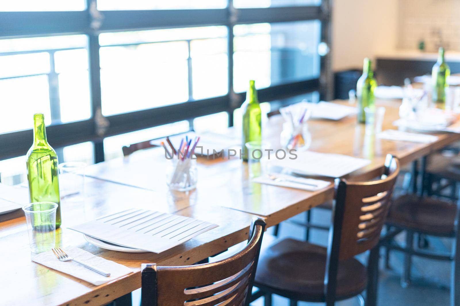 Long party table set for kids birthday party at the cooking school.