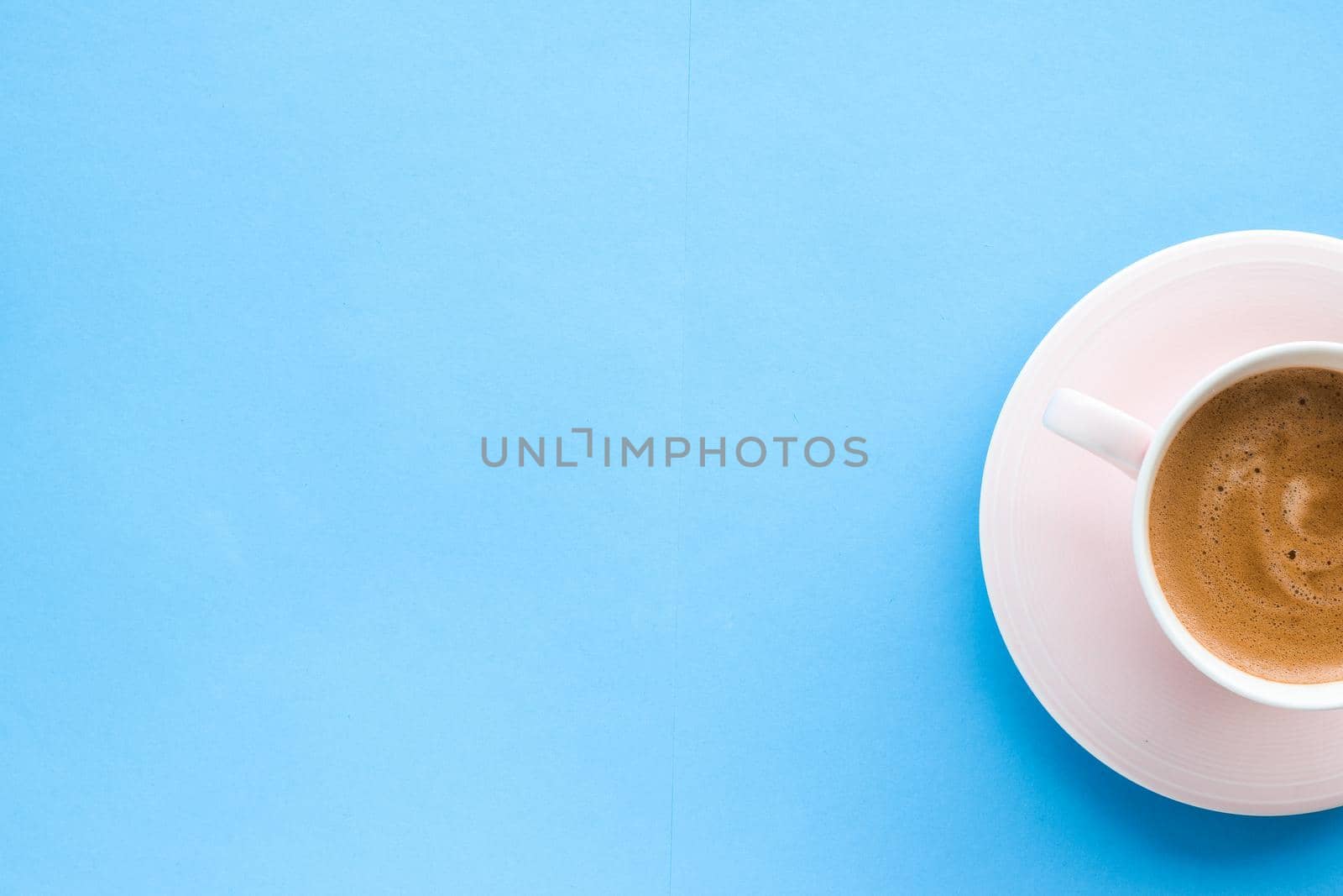 Breakfast, drinks and modern lifestyle concept - Hot aromatic coffee on blue background, flatlay