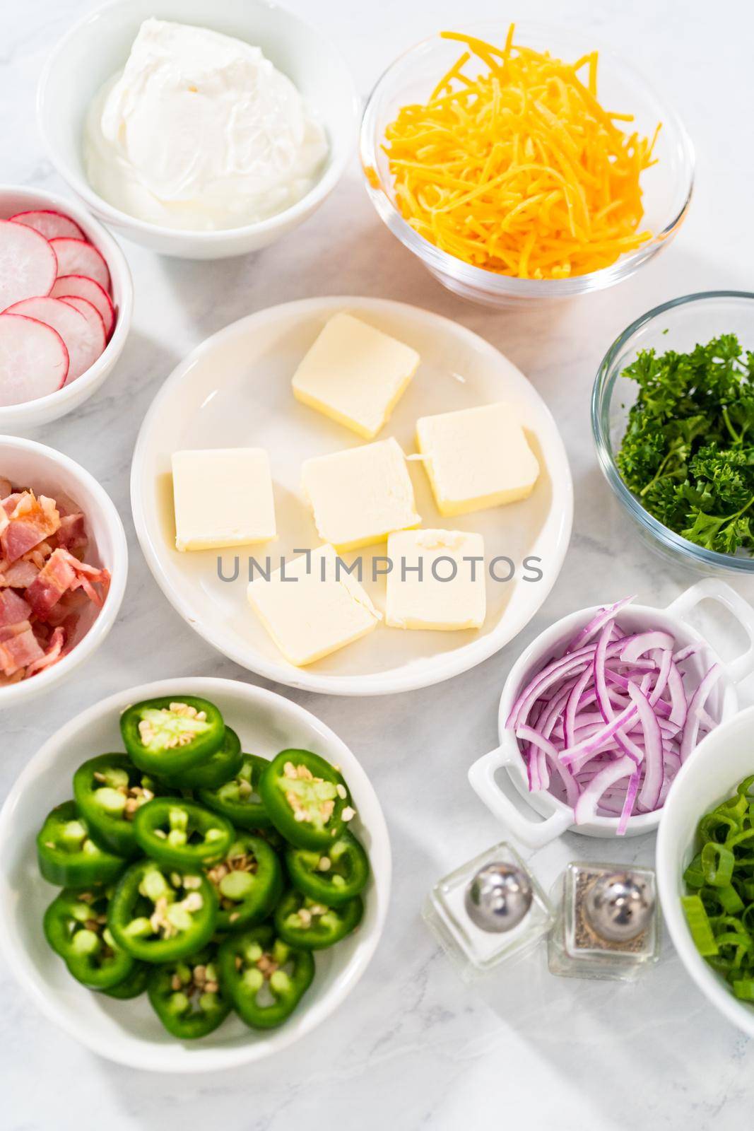 Pressure Cooker Baked Potatoes. Garnishes in small pinch bowls to serve over the baked potatoes.