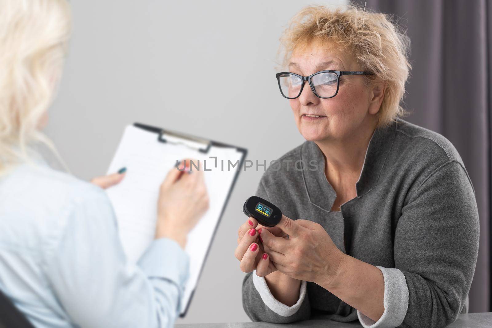 Parkinson and alzheimer female senior elderly patient with professional doctor consult in or counsel diagnosis health in hospital. Medical healthcare concept