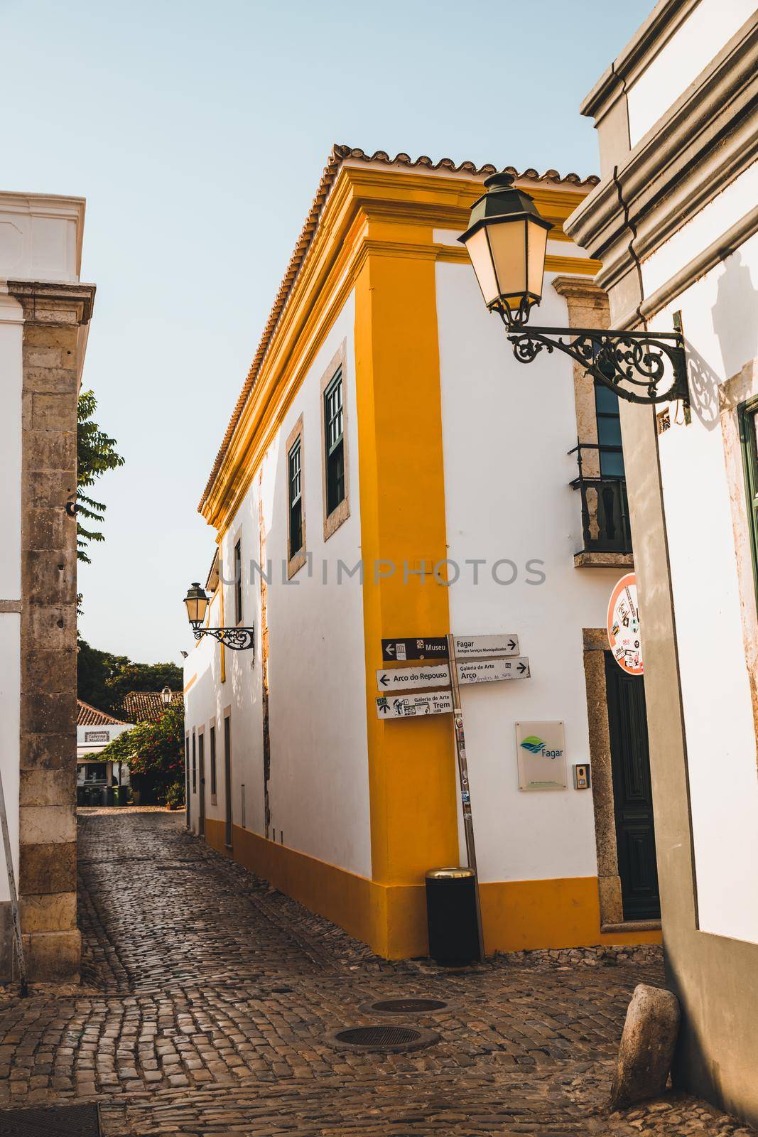 Empty street in Faro, Portugal by fabioxavierphotography