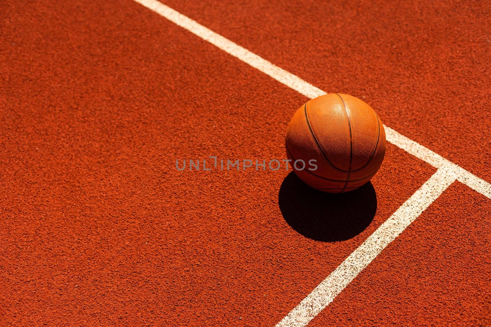 Basketball on Court Floor close up by Andelov13