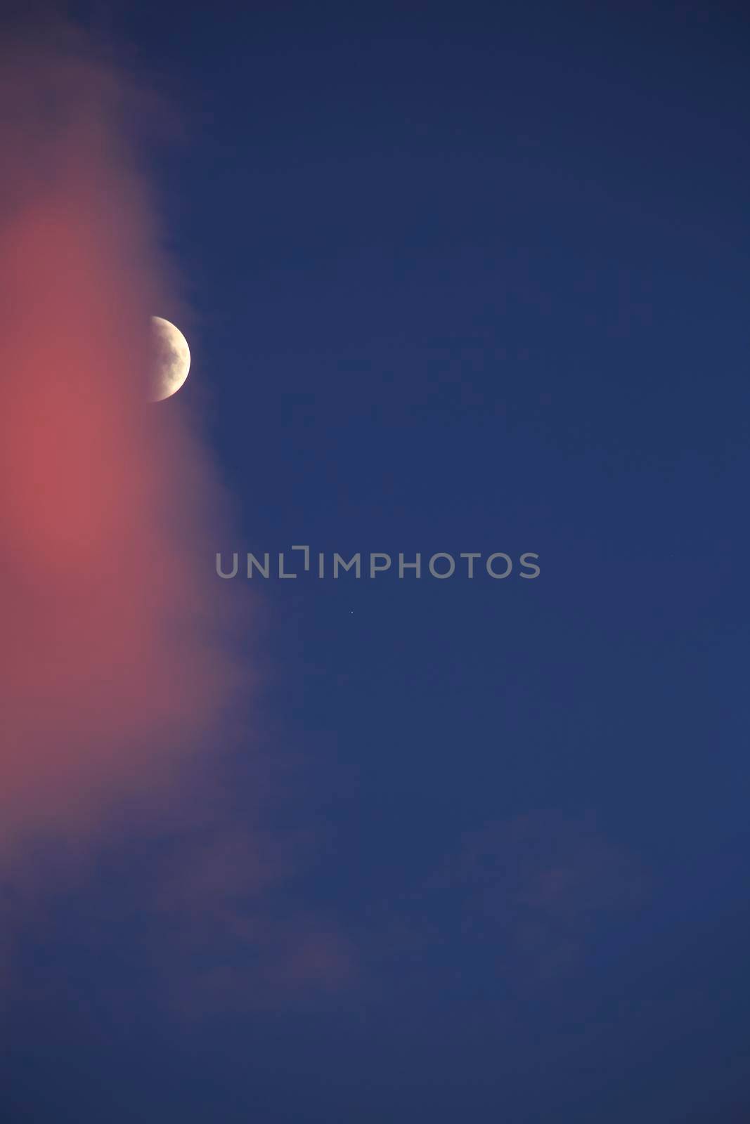 Beautiful crescent moon between pink clouds by soniabonet