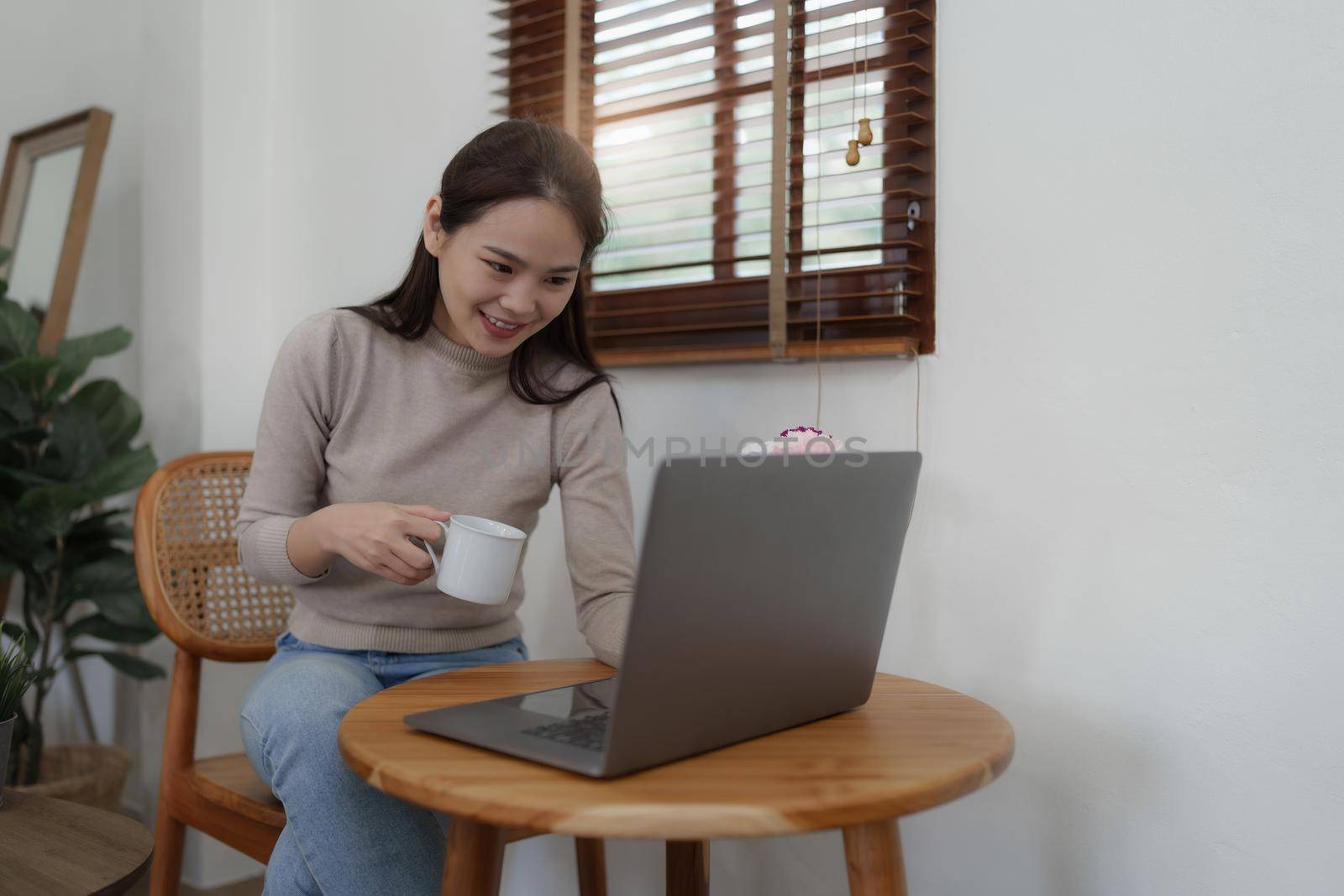 Business woman trading and analysis on laptop. Planning and strategy on Stock market by itchaznong