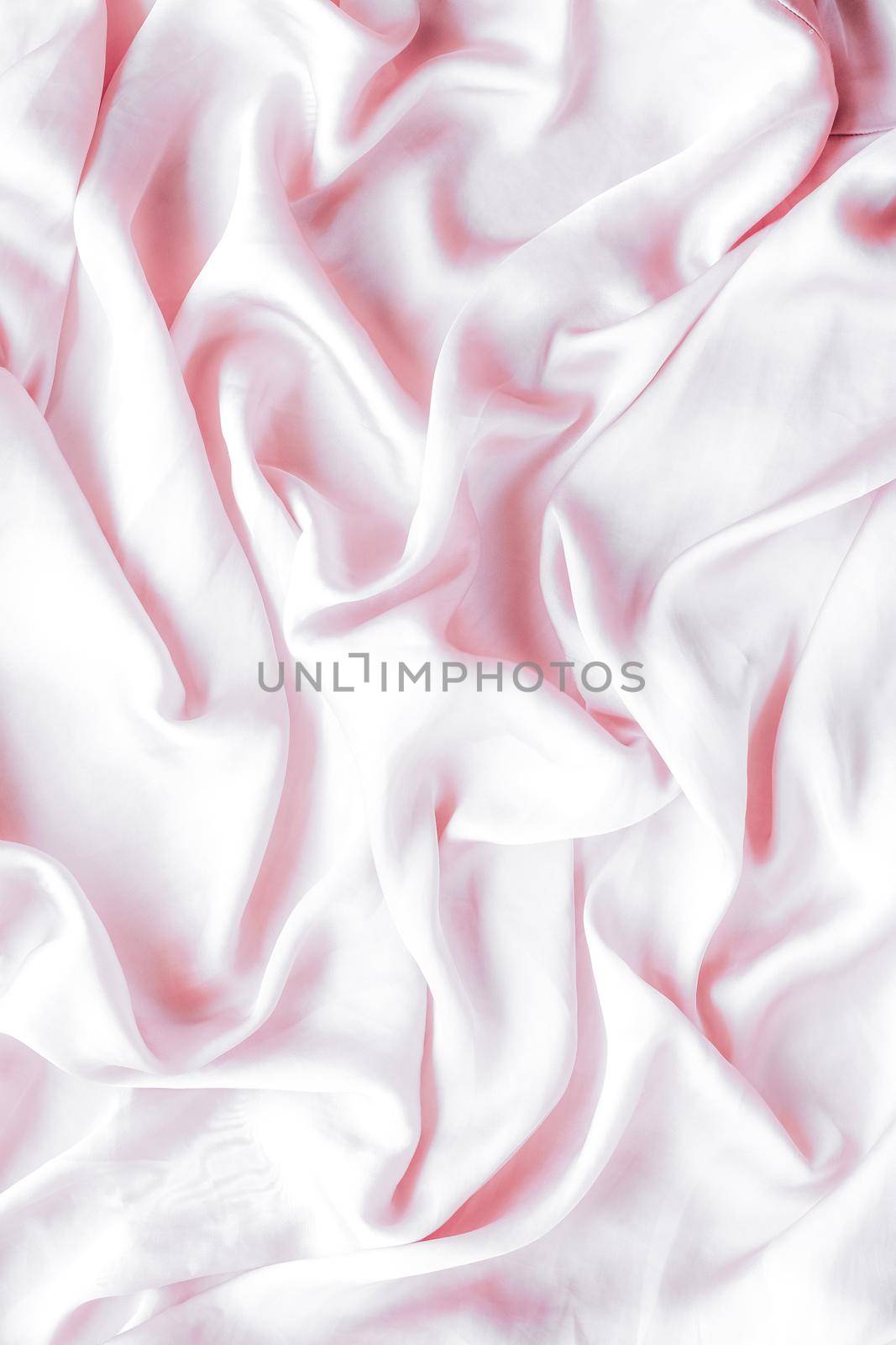 Elegant fabric texture, abstract backdrop and modern pastel colours concept - Pink soft silk waves, flatlay background