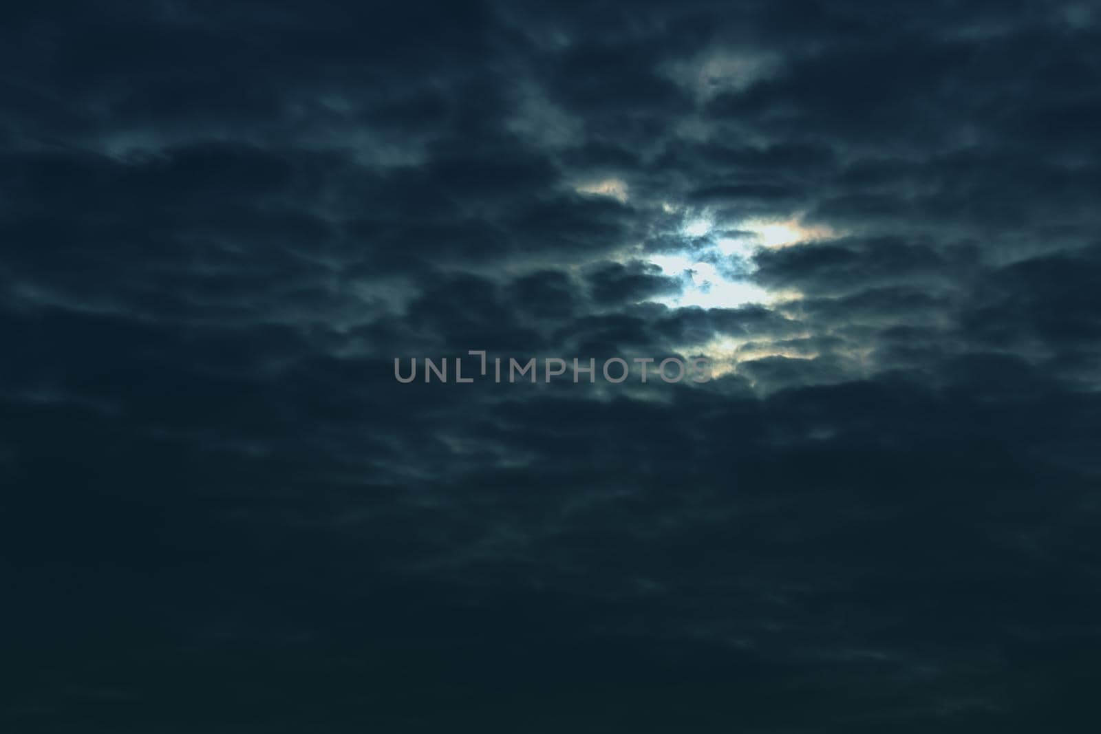 Beautiful abstract nightly clouds landscape in blue color