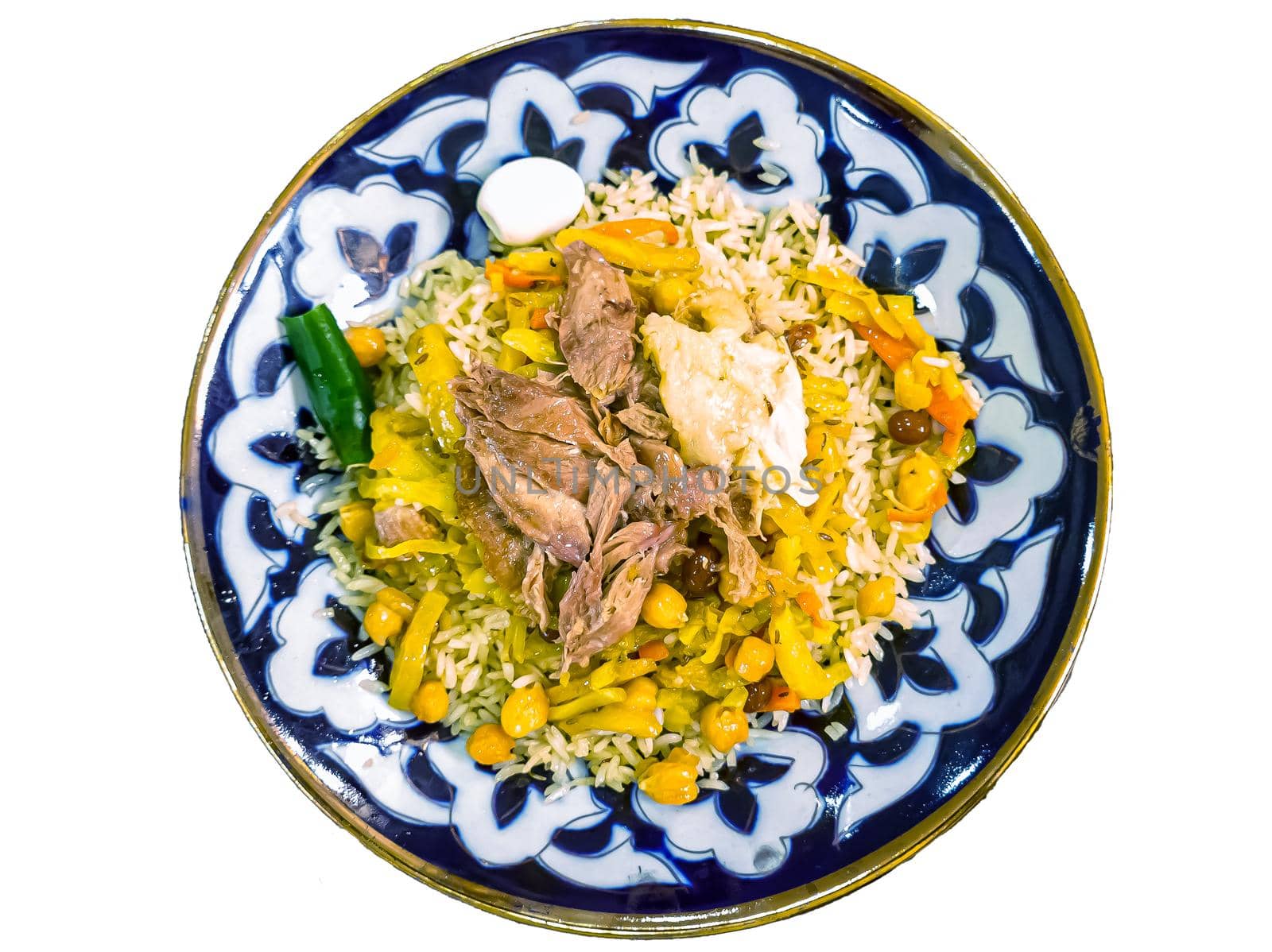 Traditional Uzbek pilaf from Samarkand. Meat, vegetables and rice are not mixed and laid out in layers