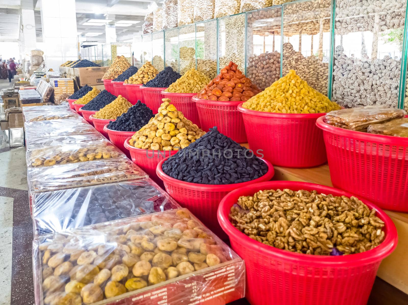 Oriental Bazaar. Almond peeled and unpeeled, nuts sales in market. Dry food, variety almonds in store. Concept of healthy eating, raw product, bazaar, diet, almond theme by Milanchikov