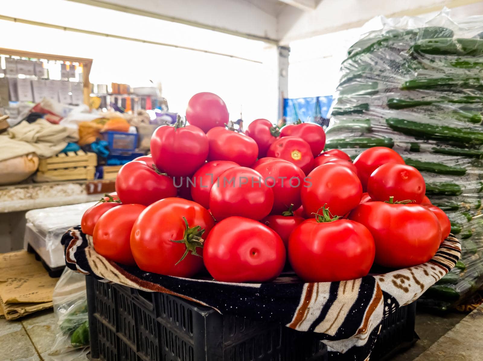 Street market with vegetables and fruits. Shopping for a bazaar. Counter with tomatoes