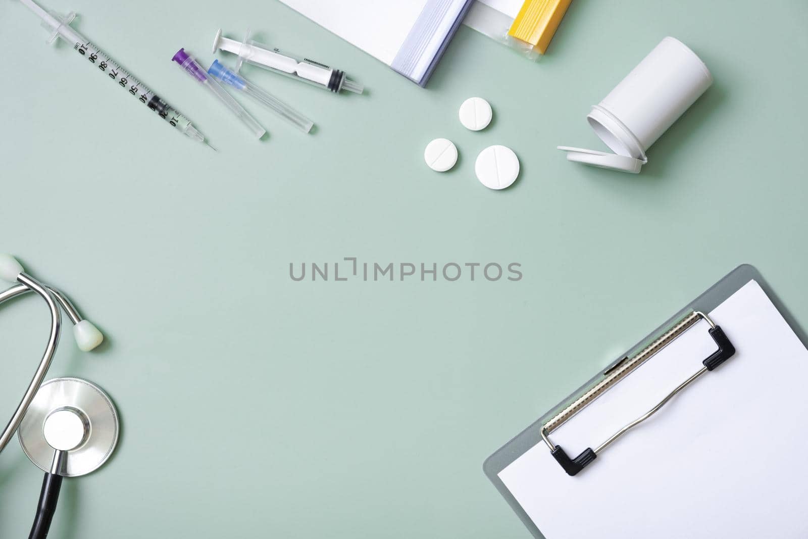 Stethoscope and folders with documents. Medical flat lay with copy space.