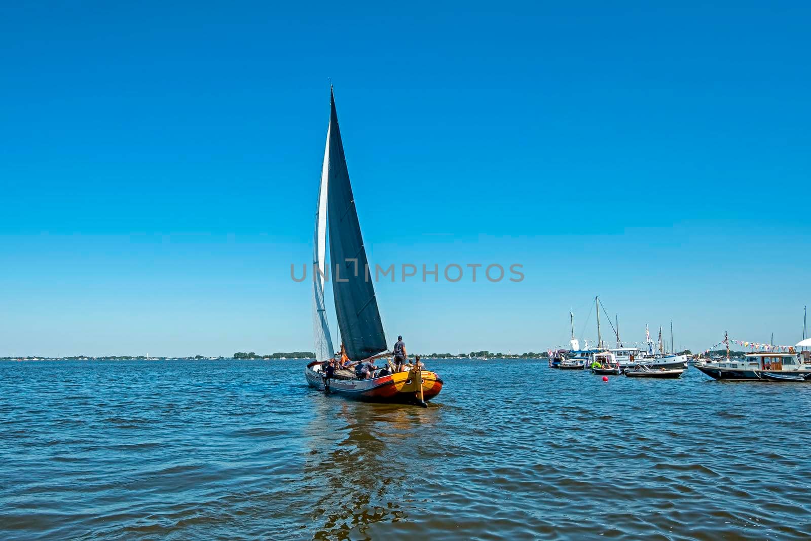 Traditional Frisian wooden sailing ship in a yearly competition in the Netherlands by devy