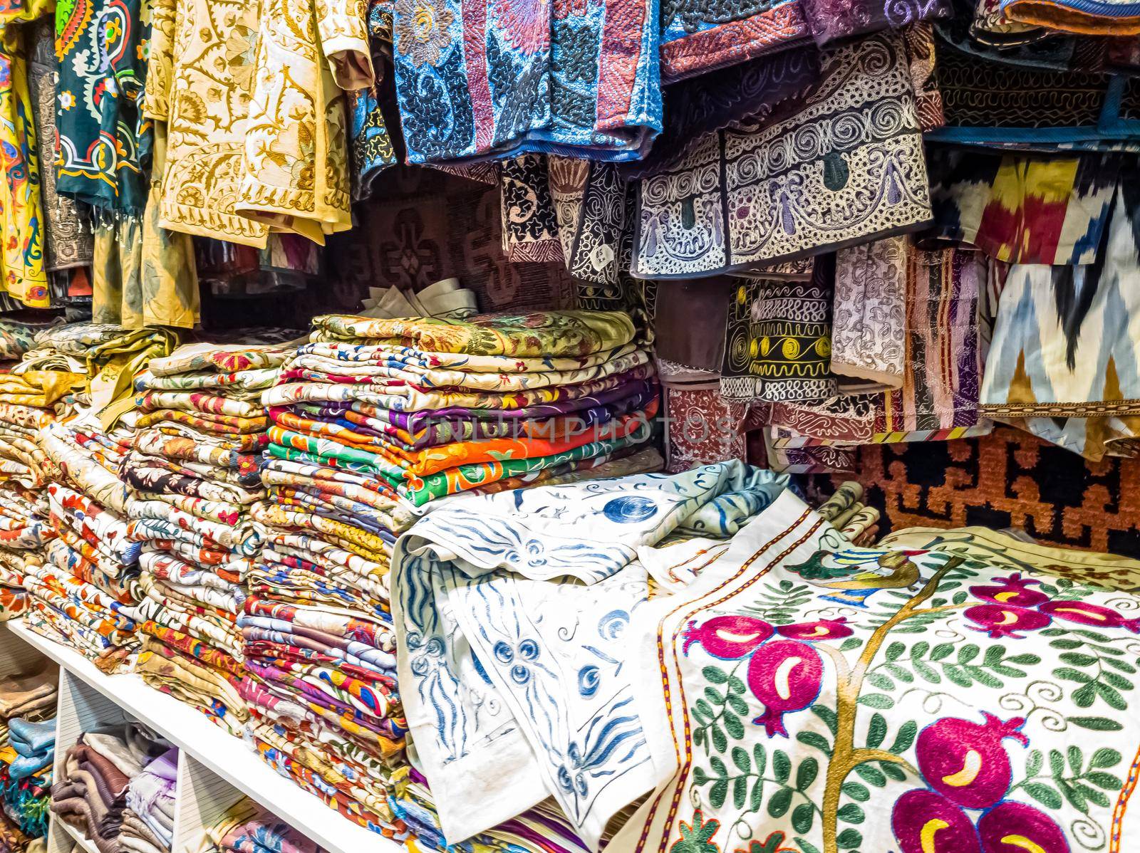 Traditional Asian cloth sold in a store in the Historic Centre of Uzbekistan by Milanchikov
