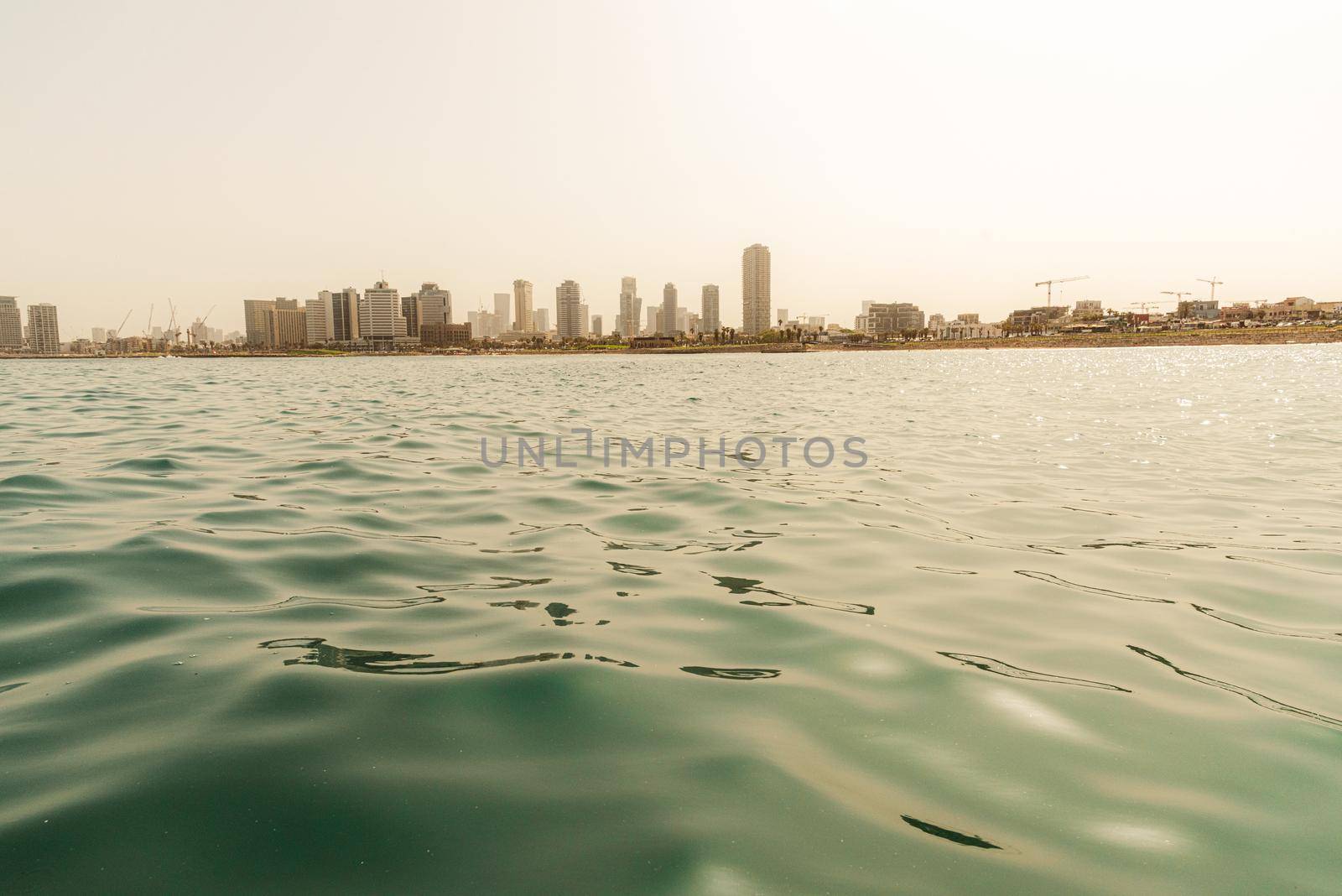 Tel Aviv skyline. A view from the water of the old Yaffa Port. High quality photo