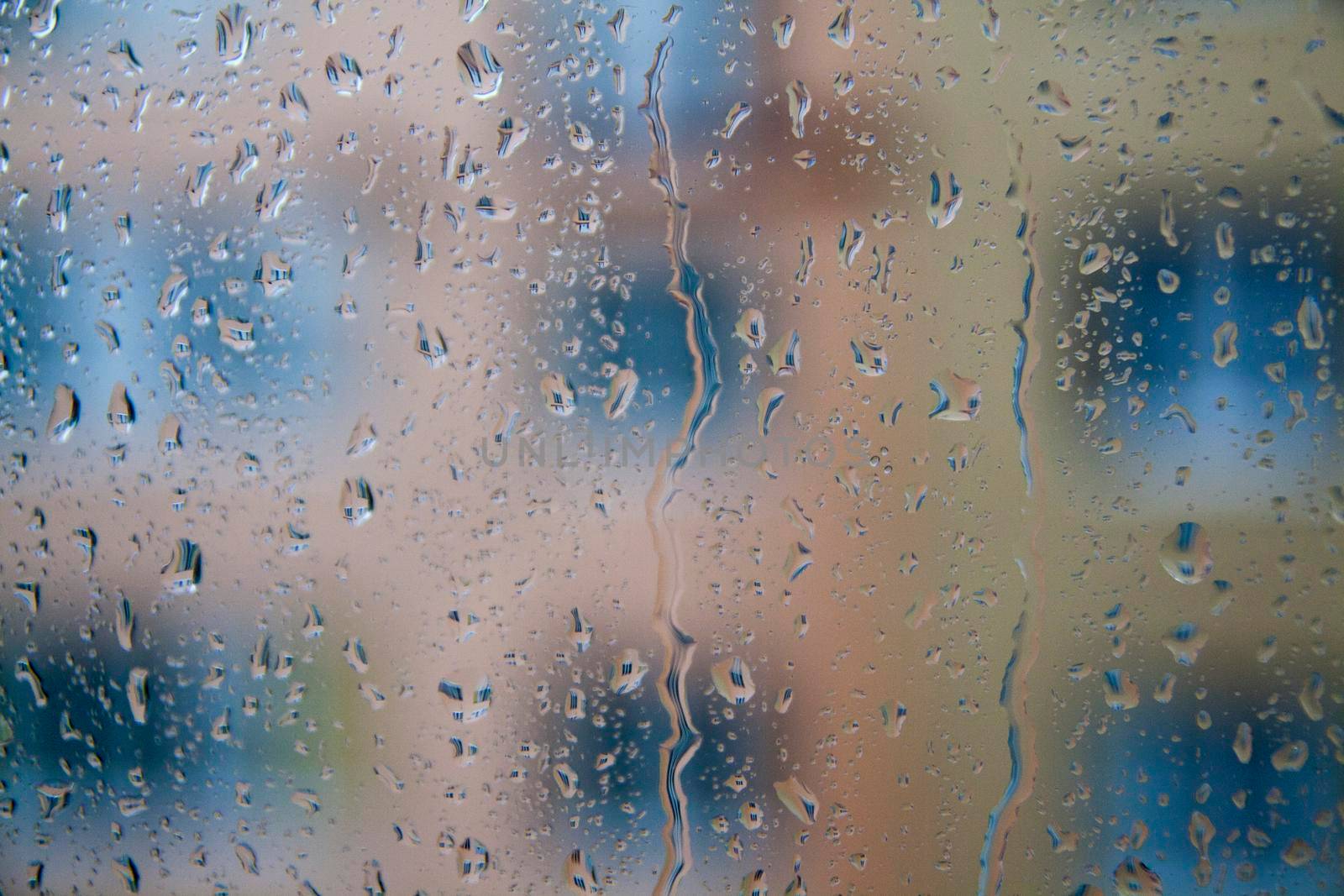 raindrops on the window - rainy background. High quality photo