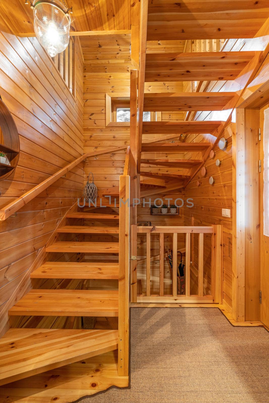 Wooden stairs in a small country house. Hallway of cozy house in a village