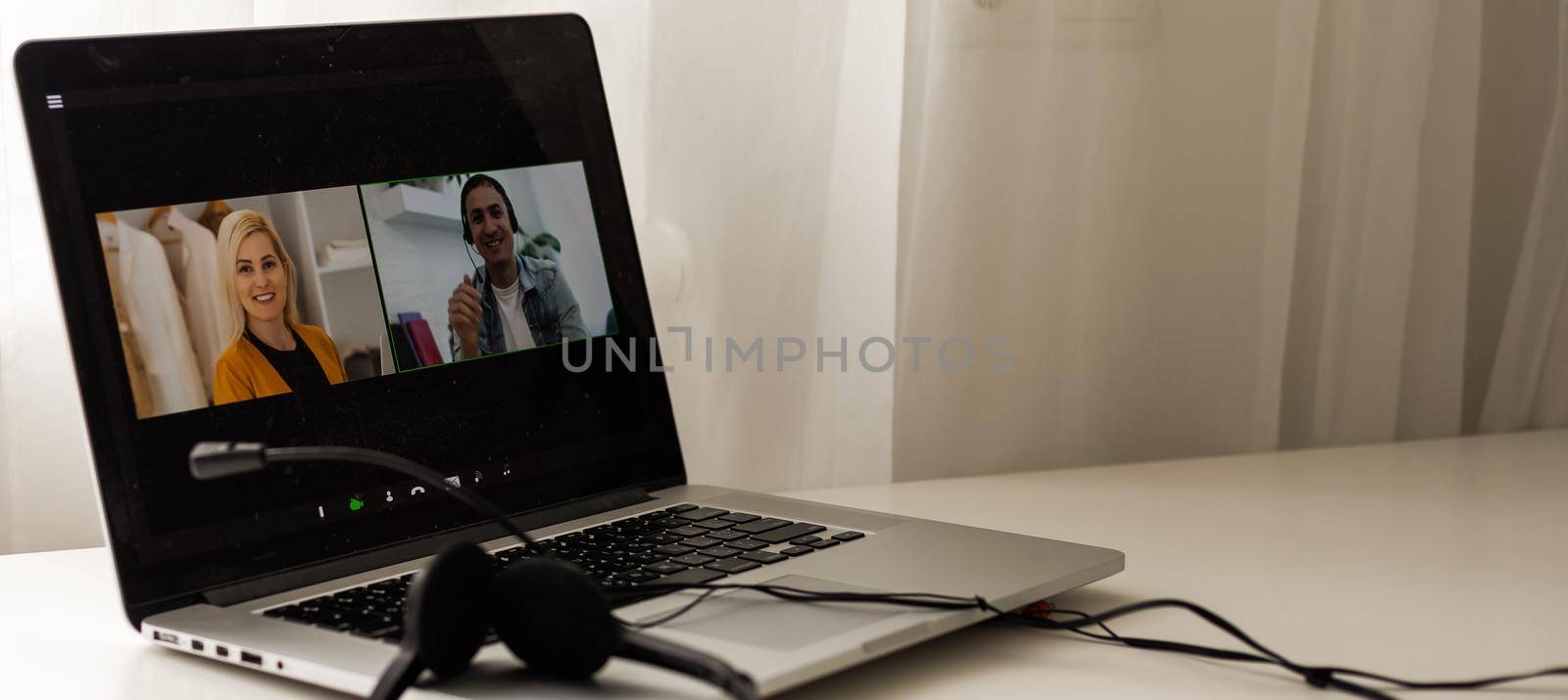 Teacher Hosting Online Class Using Video Conference On Laptop by Andelov13