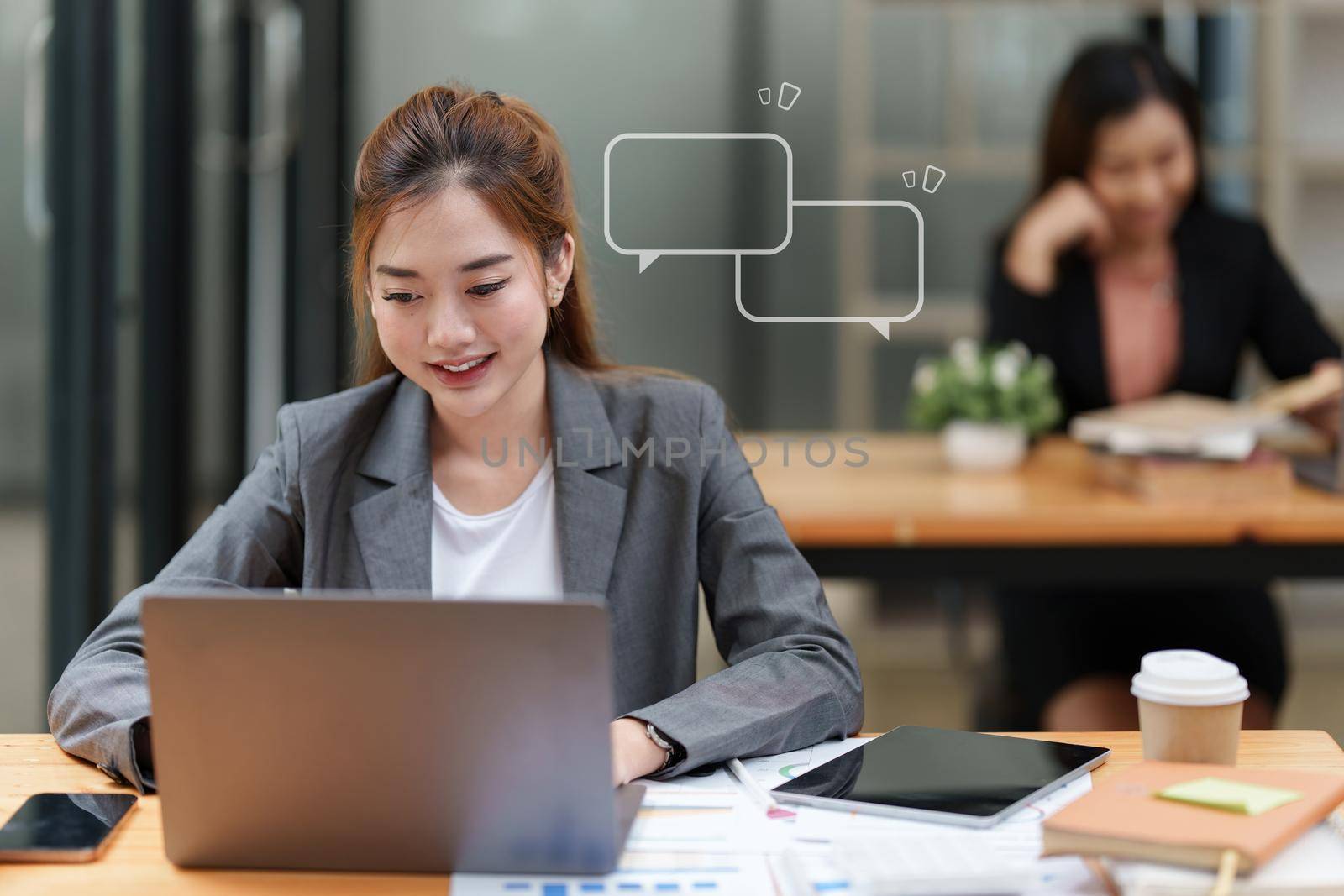 Asian businesswoman have video call meeting with partner by laptop computer.