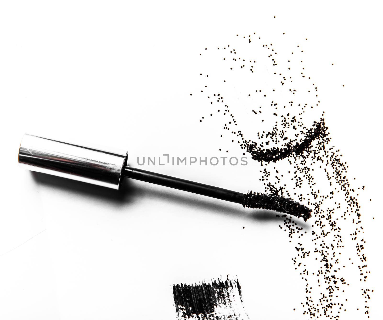 Black mascara brush stroke close-up isolated on white background by Anneleven