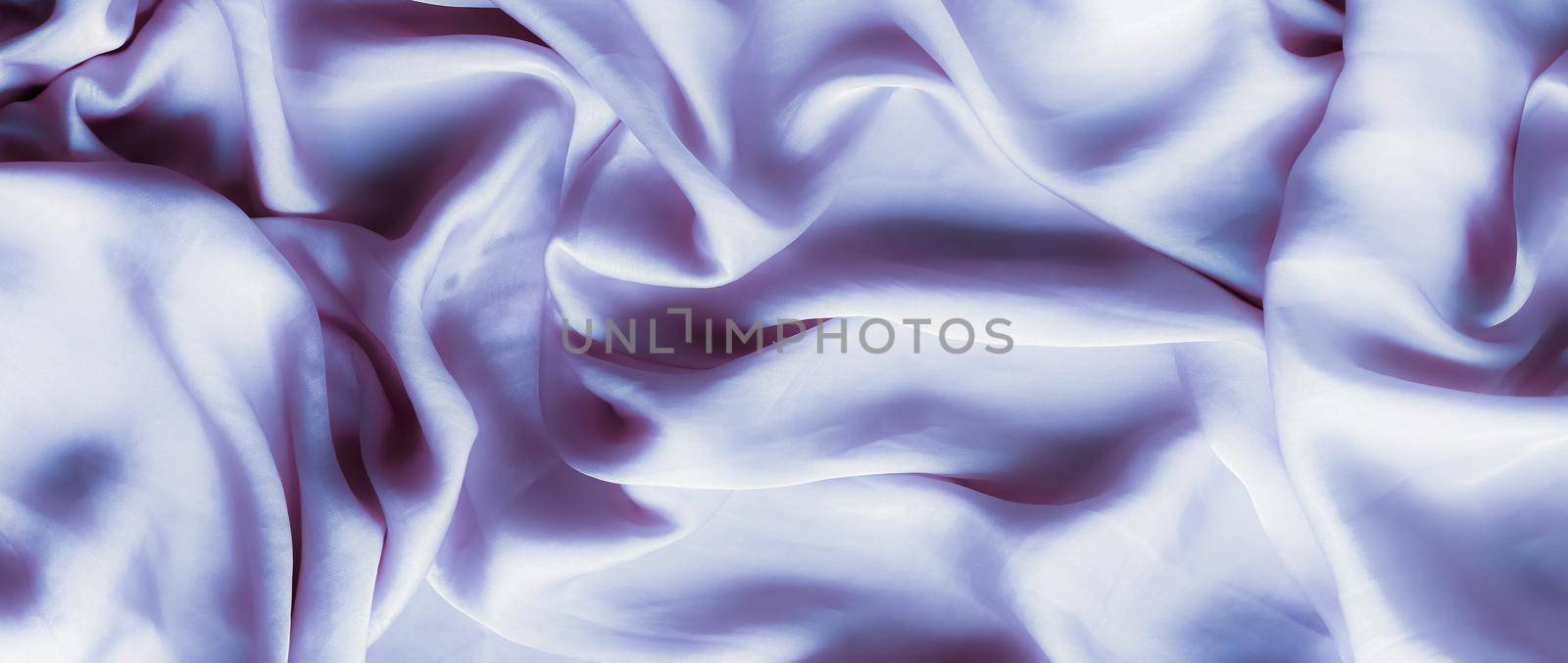 Elegant fabric texture, abstract backdrop and modern pastel colours concept - Purple soft silk waves, flatlay background